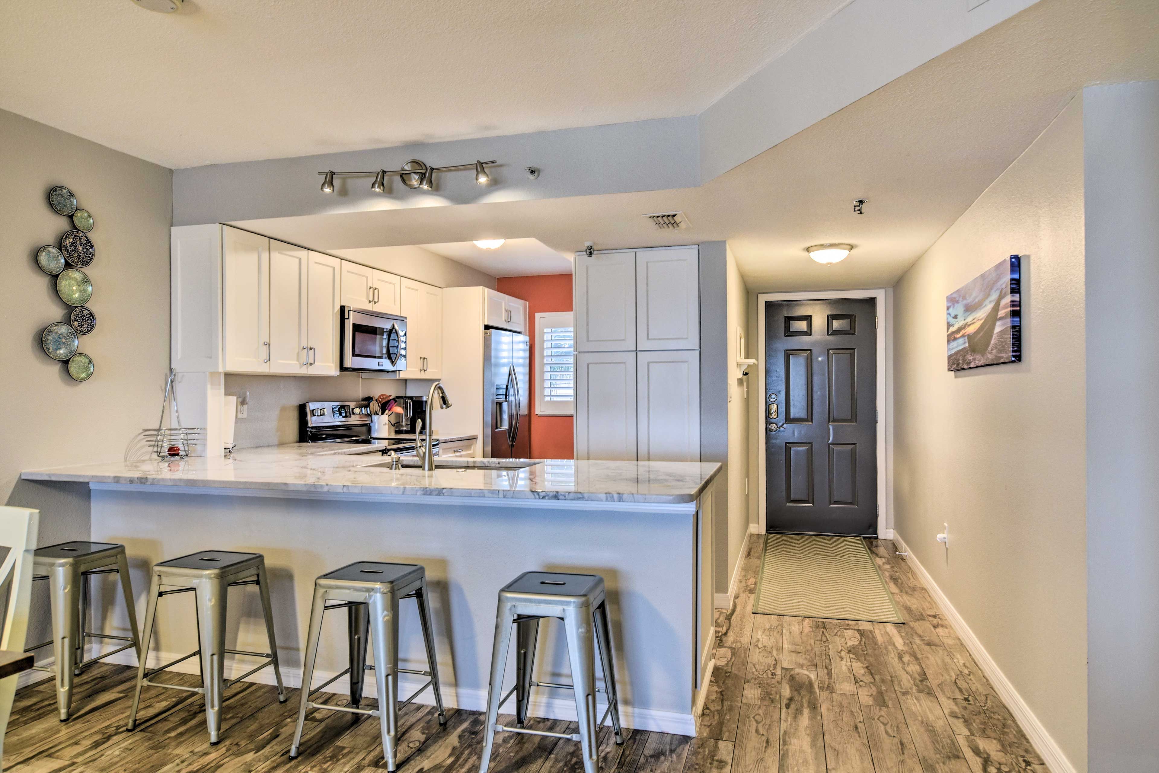Kitchen | Elevator | Access to Community Pool & Grill Area