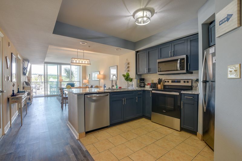 Fully equipped kitchen with Keurig coffee maker and dishwasher