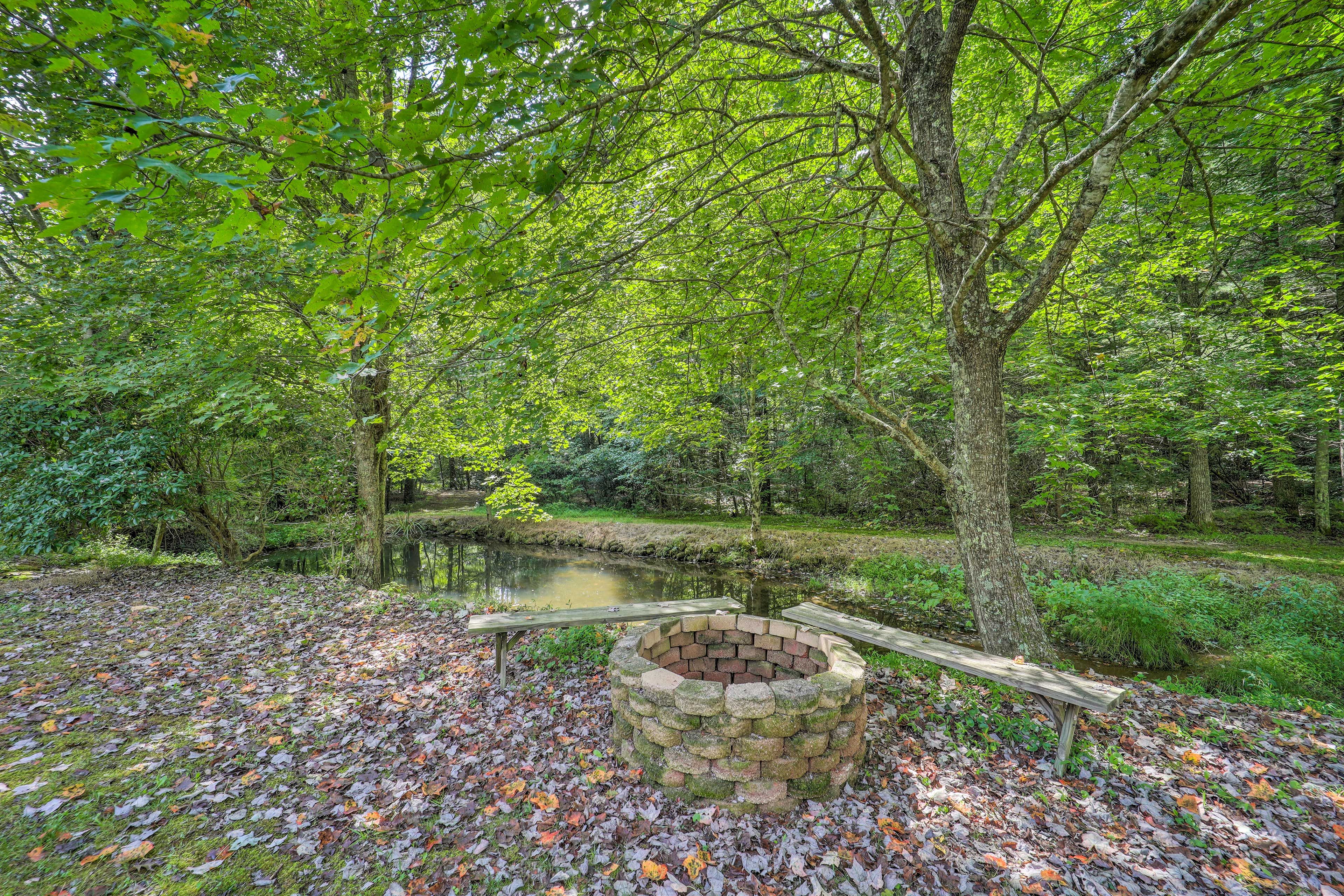Cottage Exterior | Wood-Burning Fire Pit | Pond & Creek On-Site