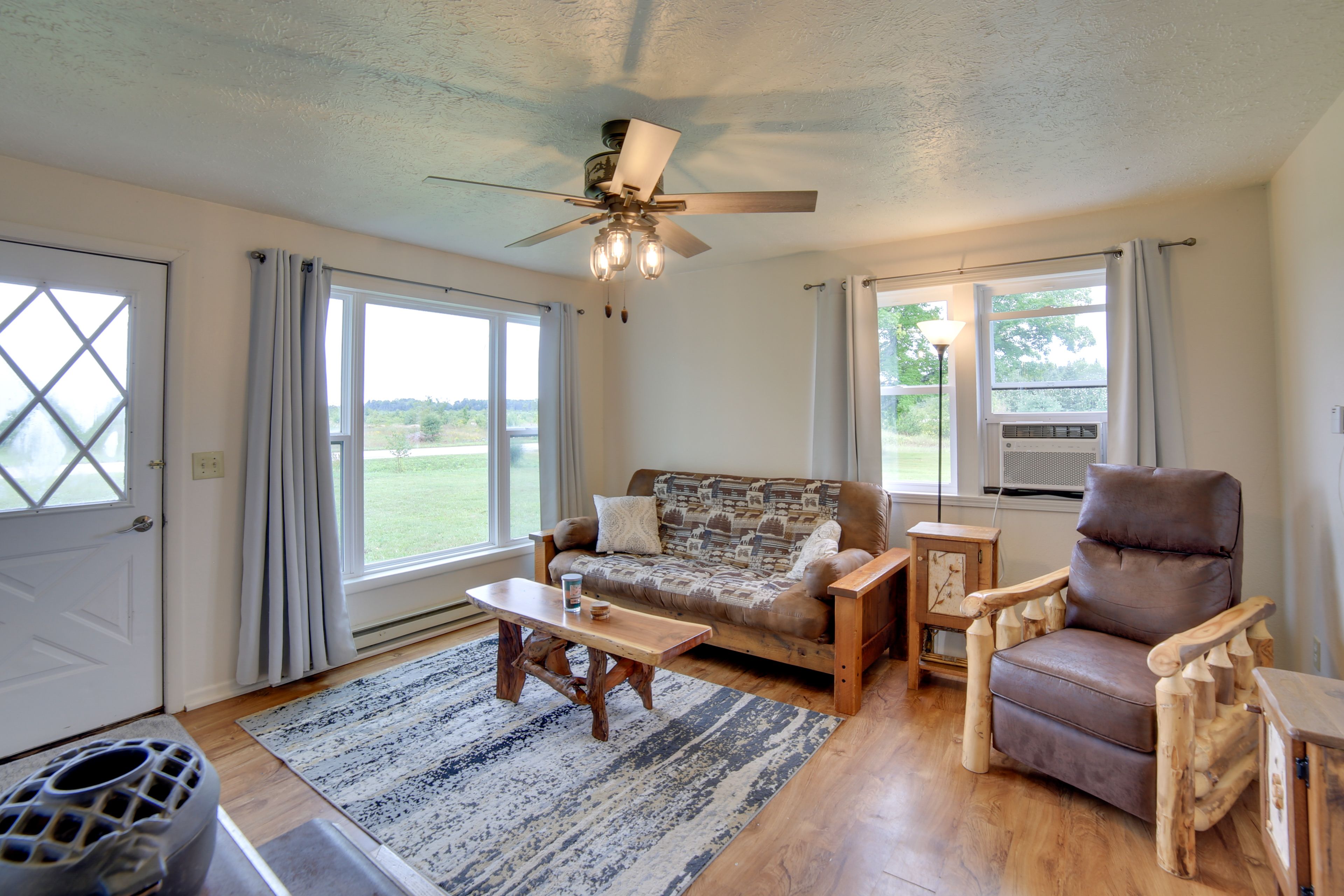 Living Room | Main Level | Twin Sleeper Sofa | Wood-Burning Stove/Fireplace