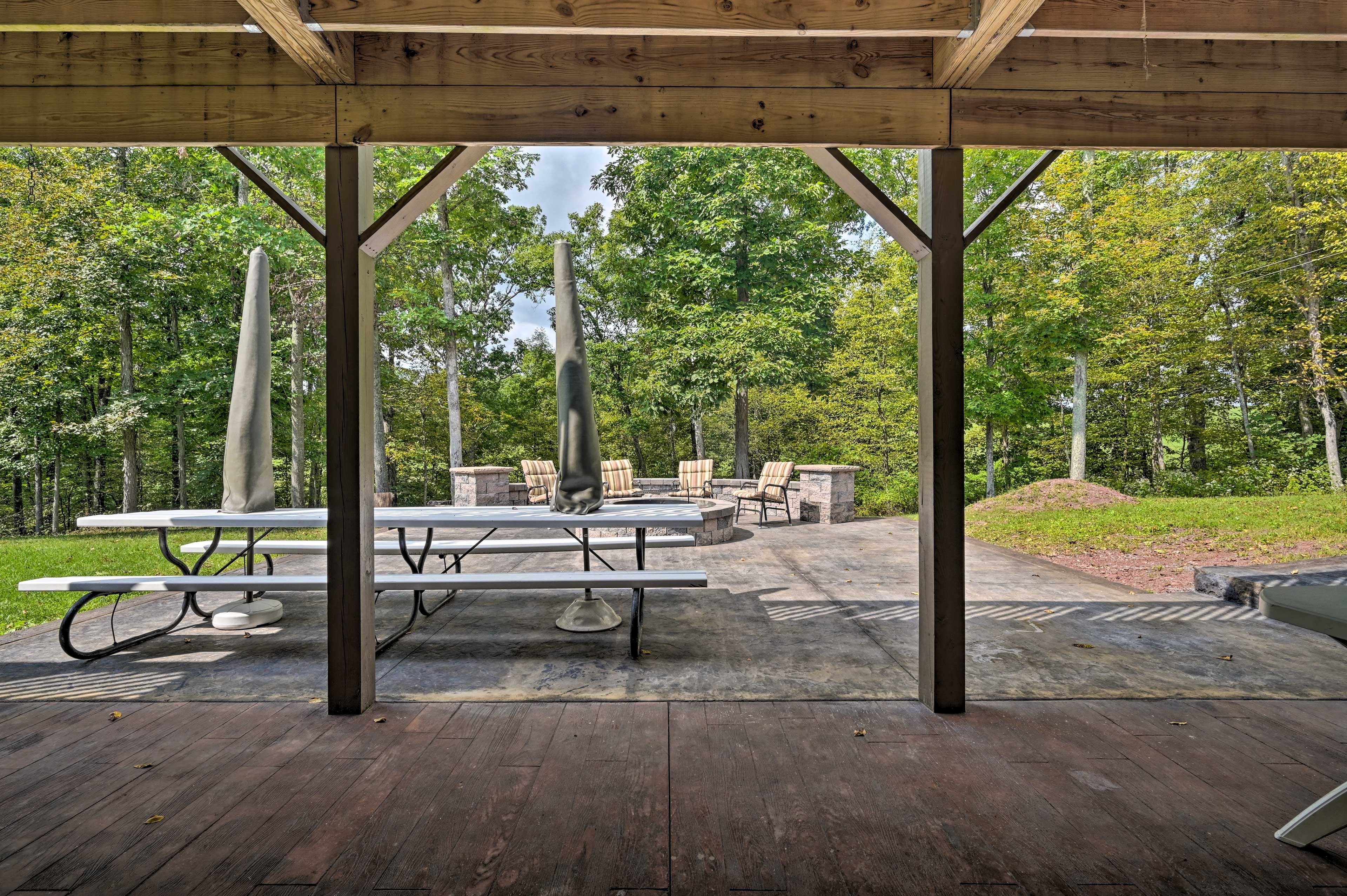 House Exterior | Furnished Patio | Wood-Burning Fire Pit