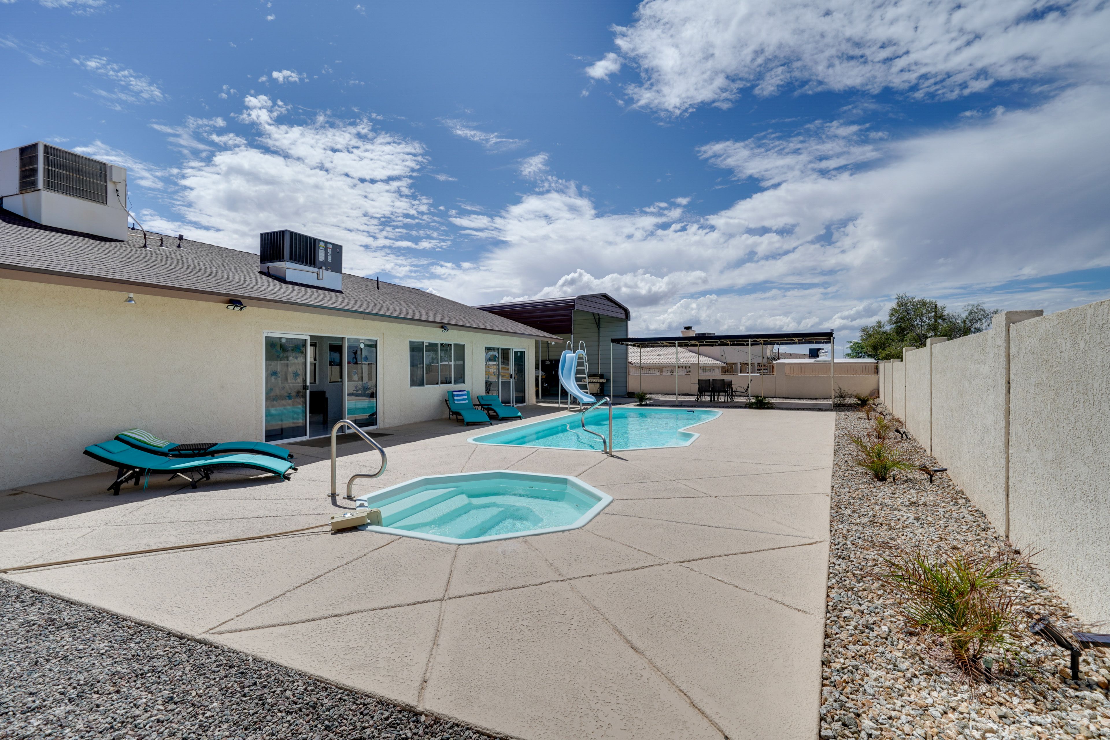 Patio | Pool (Depth 3'-6') | Hot Tub | Outdoor Seating & Dining