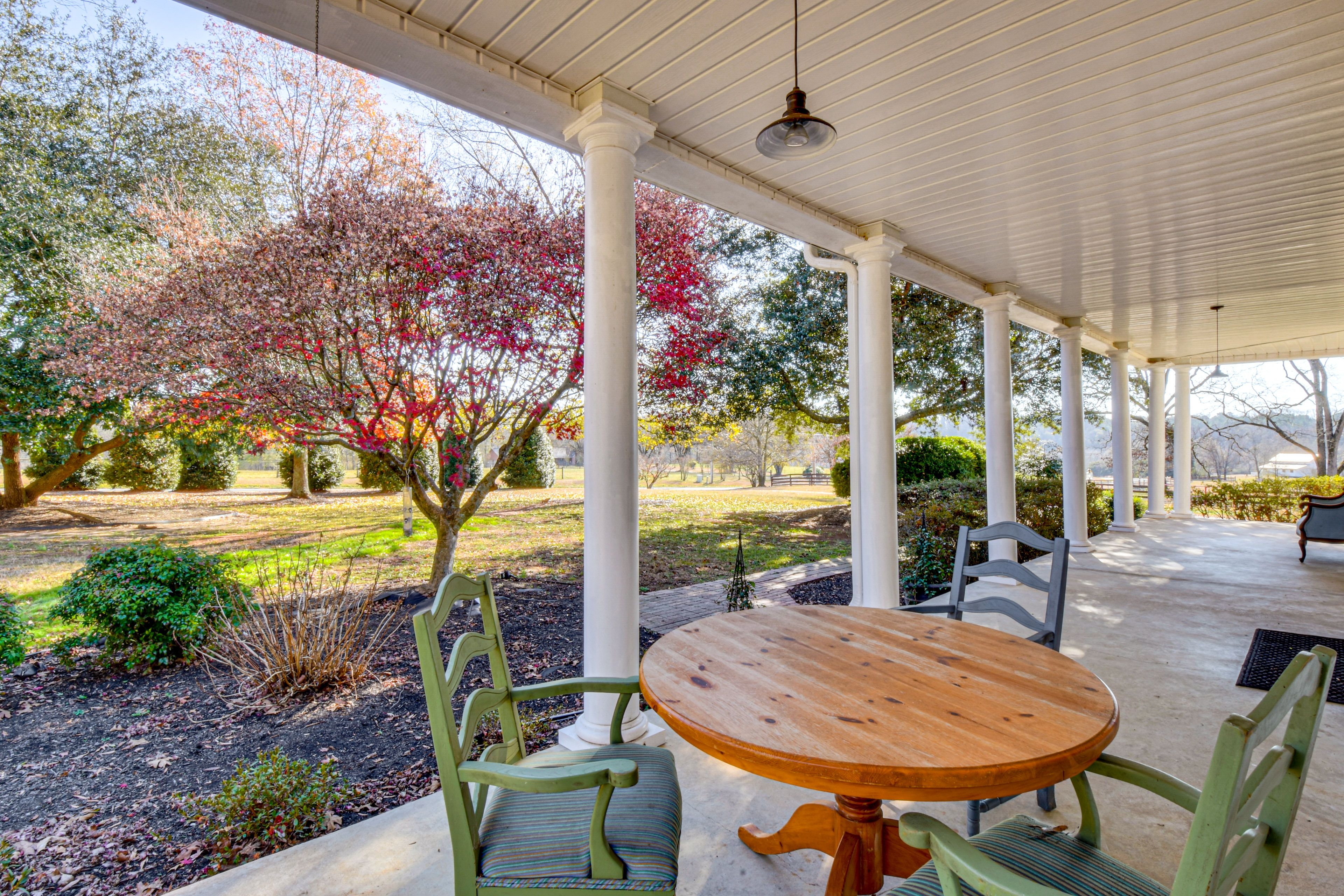 Property Exterior | Wraparound Porch w/ Seating