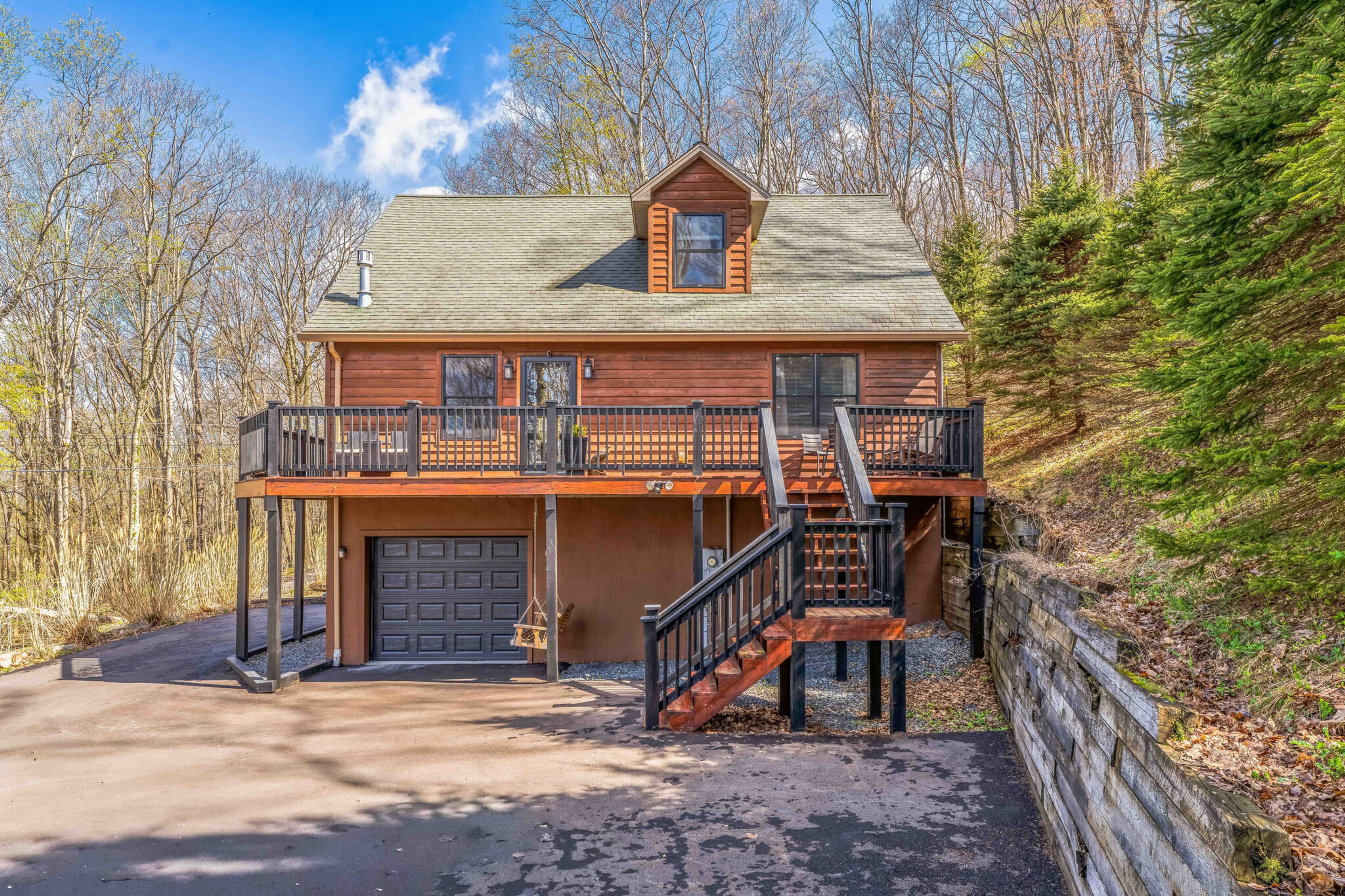 Cabin Exterior | 1,795 Sq Ft | Community Amenities | Keyless Entry