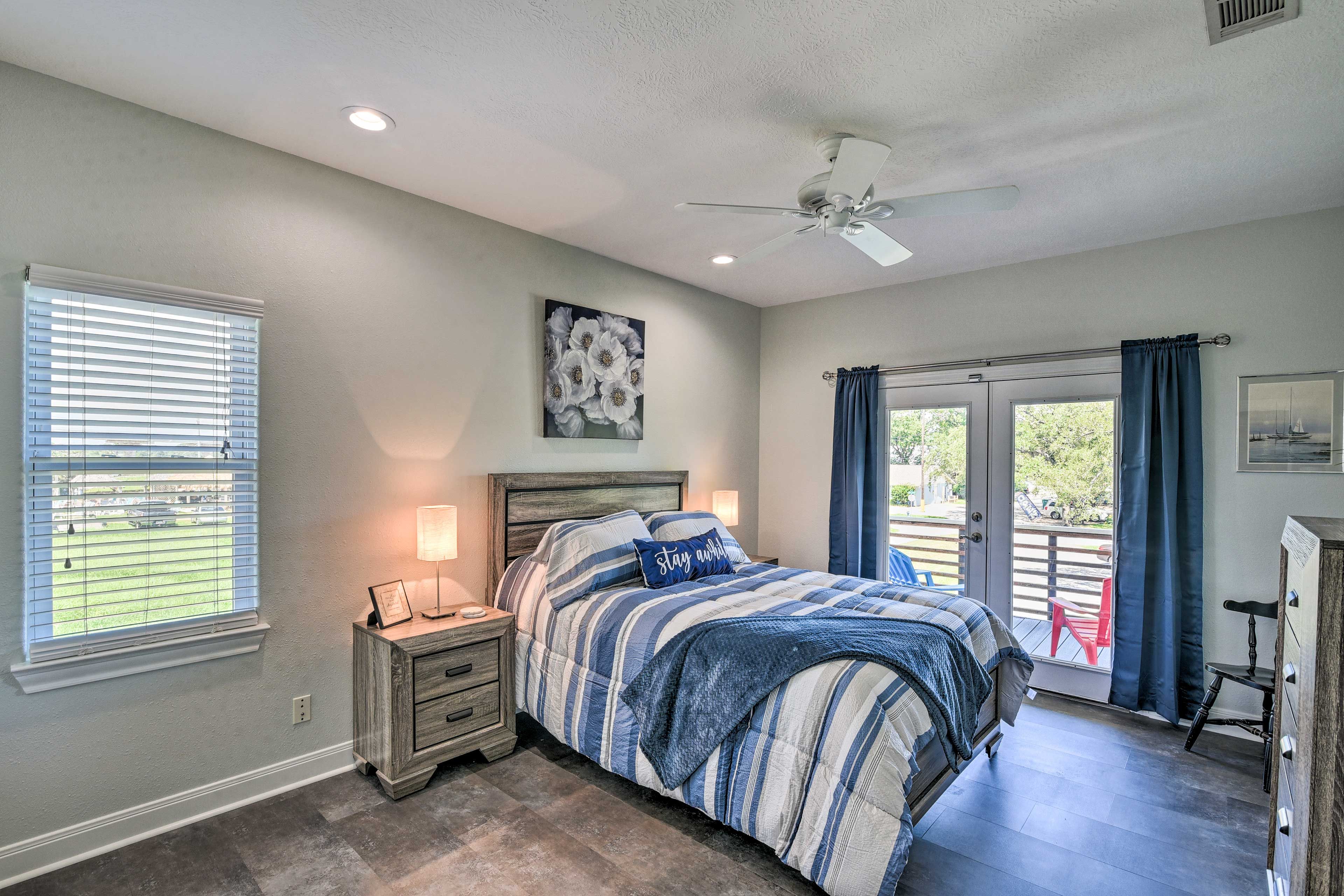 Bedroom 1 | 1st Floor | Queen Bed  | Closet | Dresser | Balcony Access