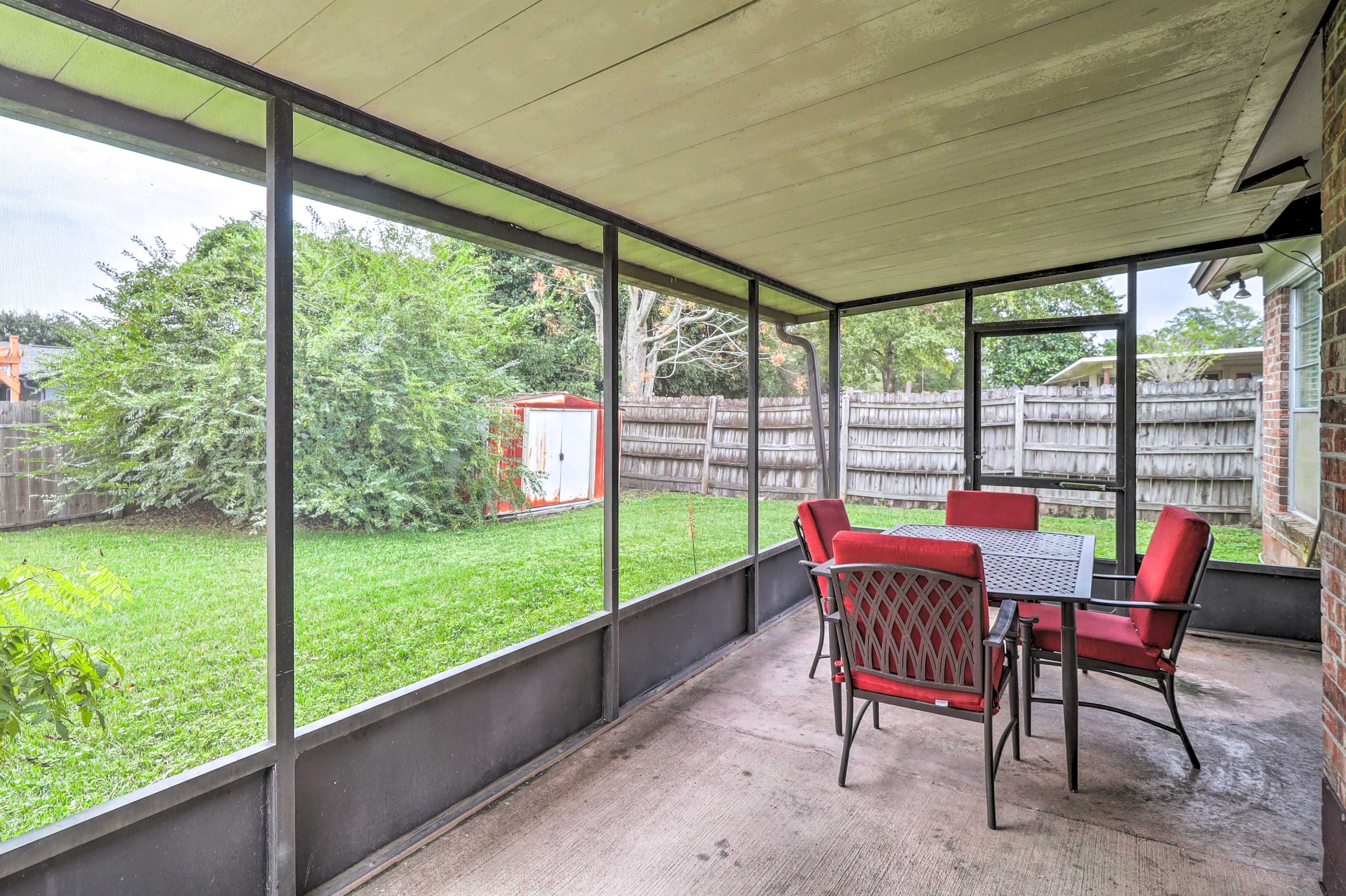 Screened Porch | Outdoor Dining Area | Private Yard