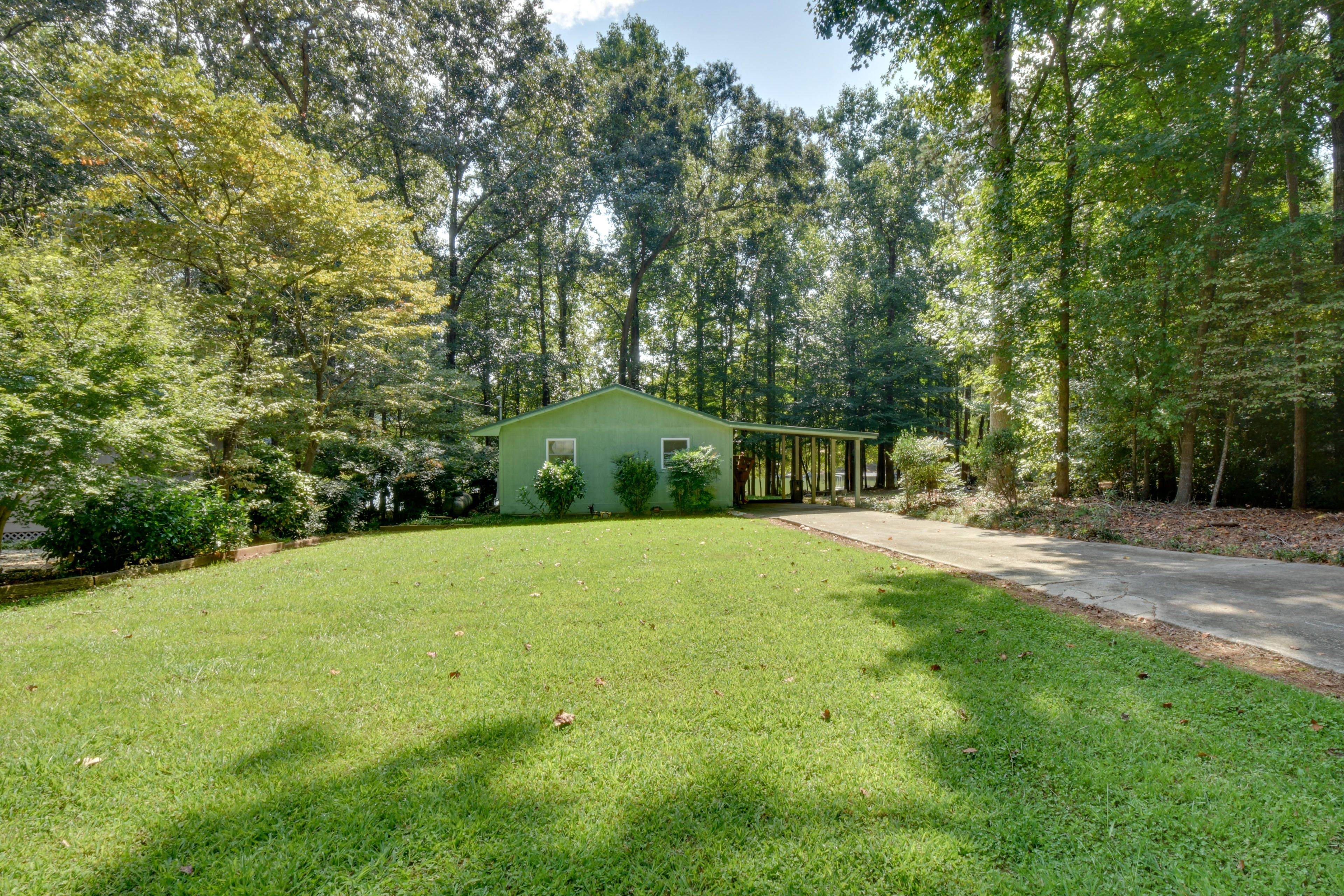 Property Exterior | Driveway (1 Vehicle) | RV Parking Allowed On-Site
