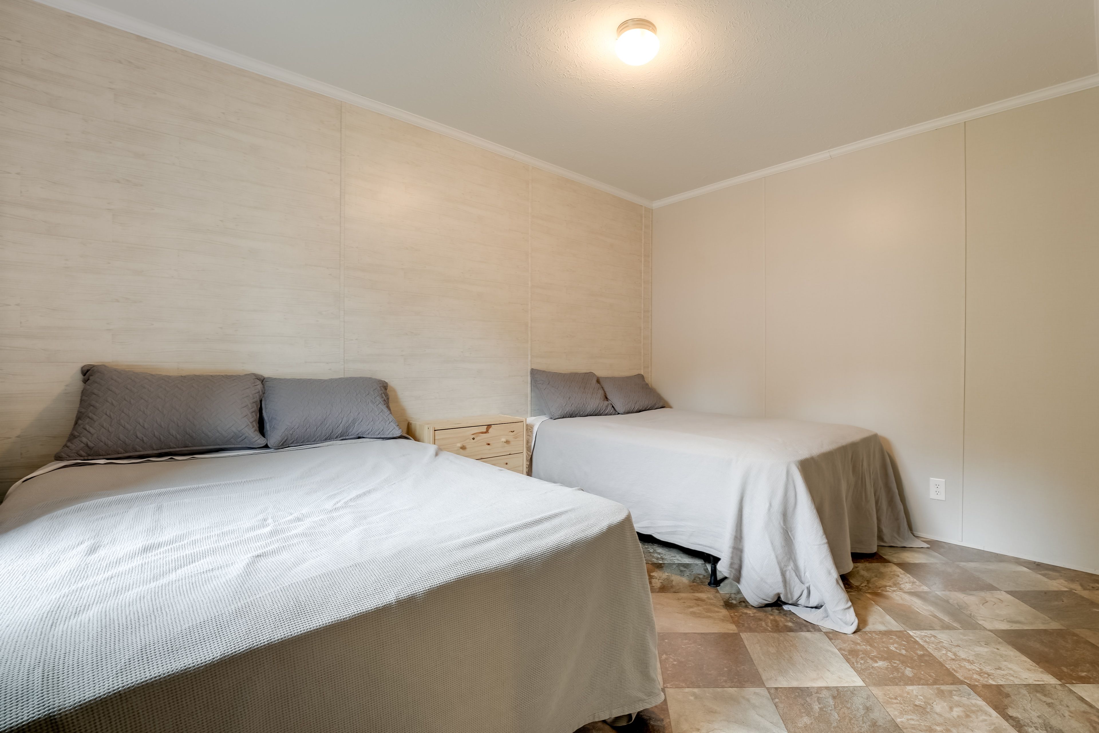 Bedroom 1 | 2 Full Beds | Linens & Towels Provided