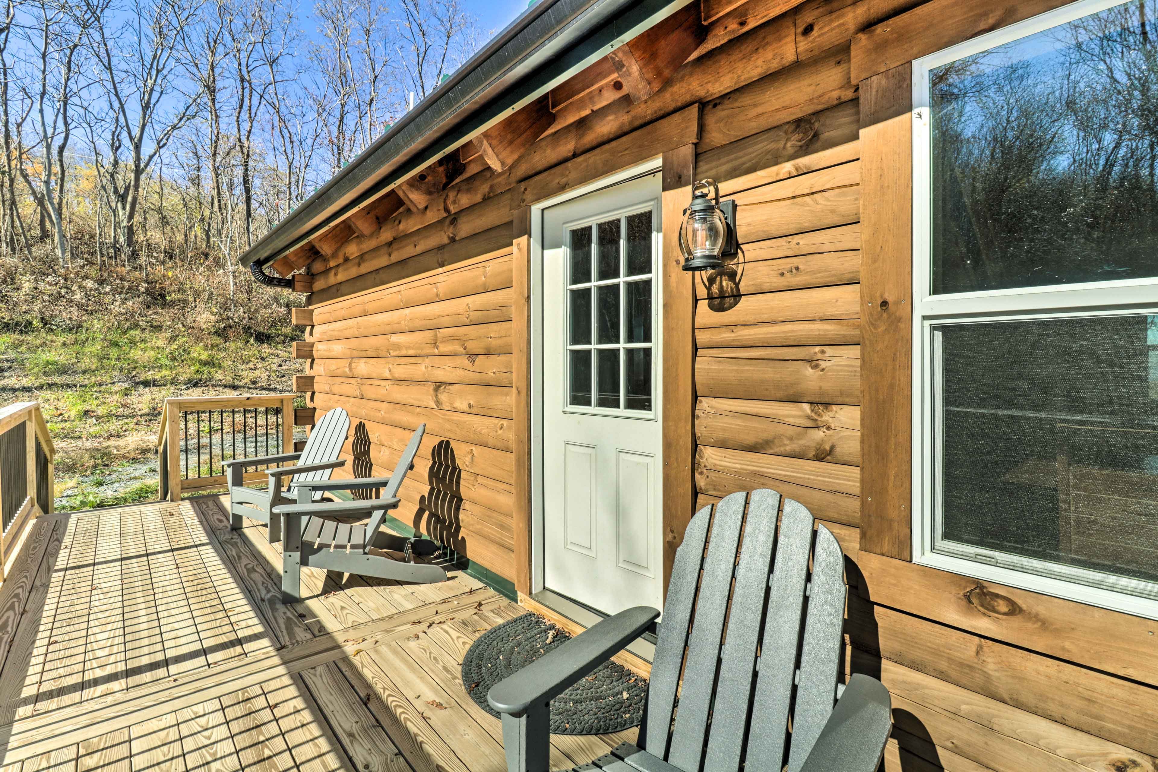 Cabin Exterior | Furnished Deck | Dining Area | Mountain Views