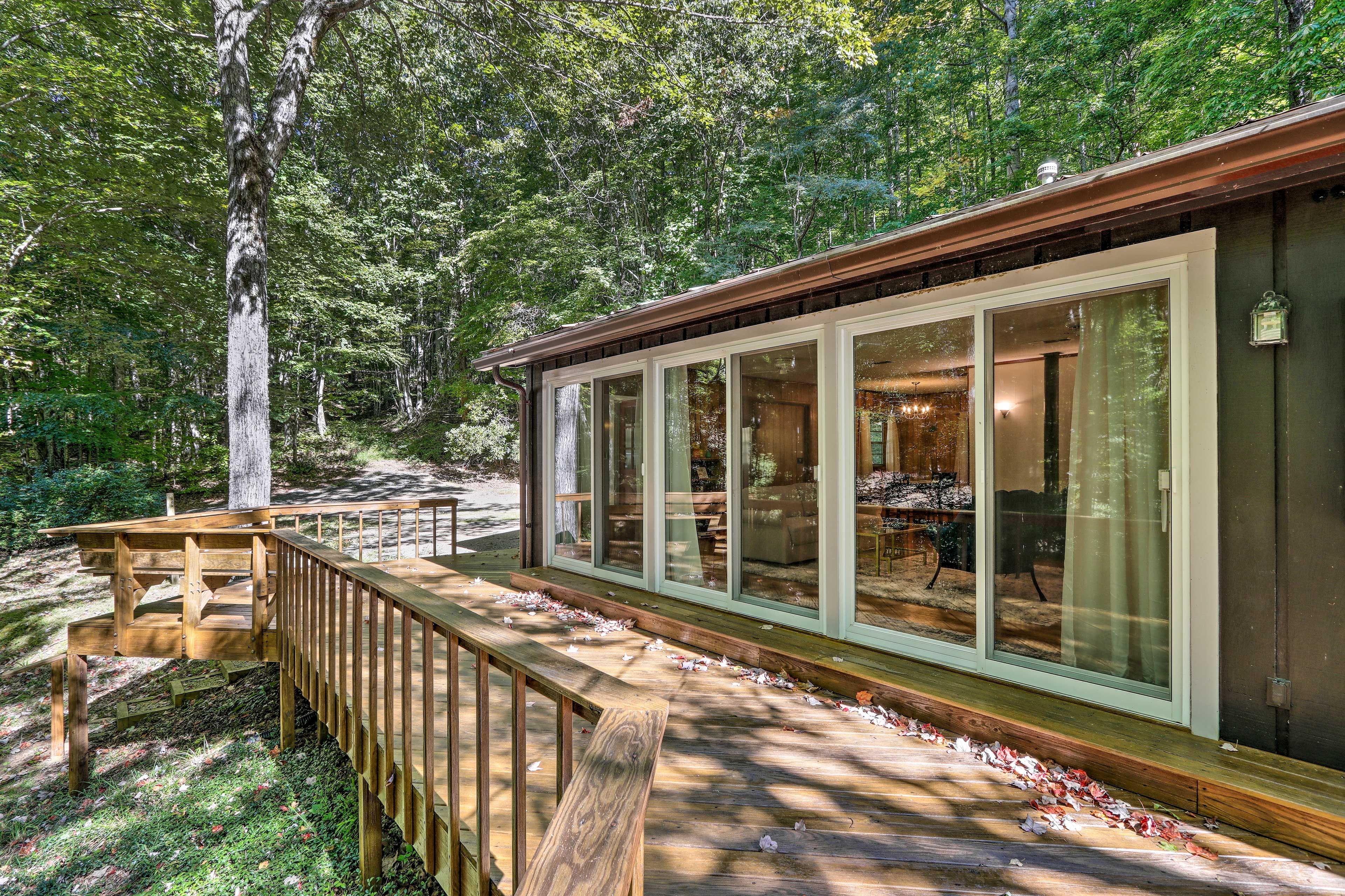 Deck | Charcoal Grill | Dining Table | Fire Pit | Hammock | Corn Hole