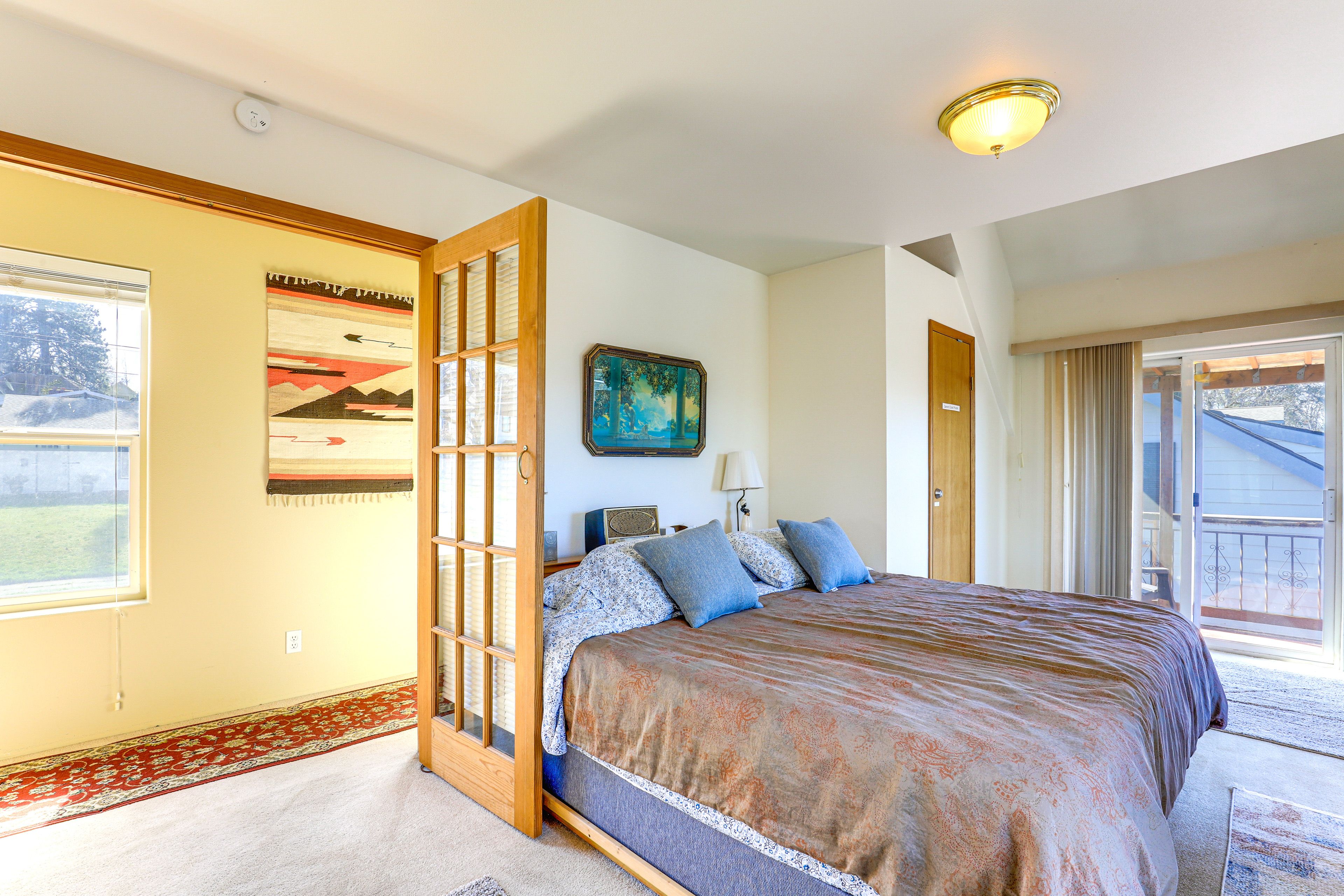 Bedroom 1 | King Bed | Flat-Screen TV | Balcony Access | 2nd Floor