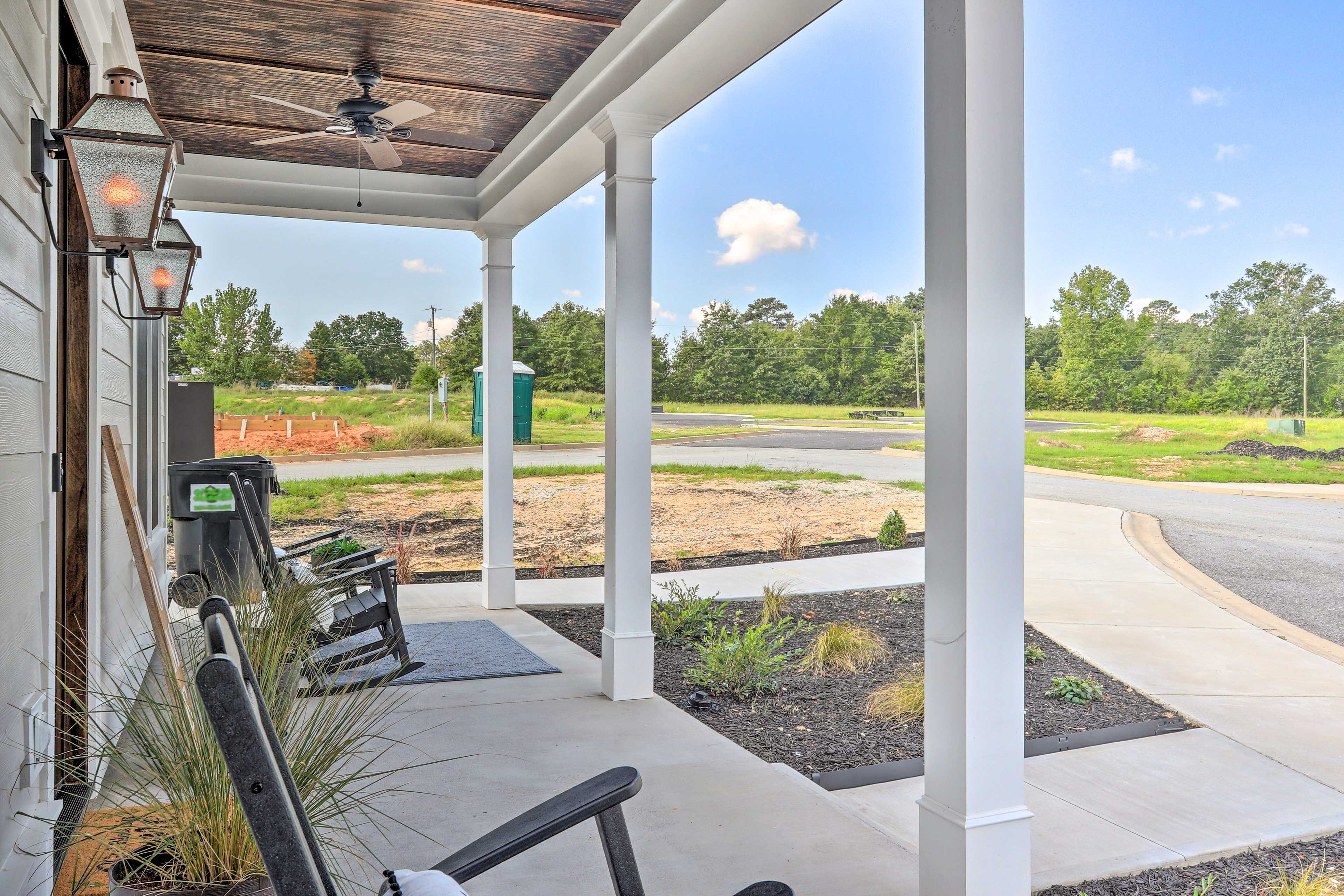 Exterior | Driveway (4 Vehicles) | Golf Cart Parking Available