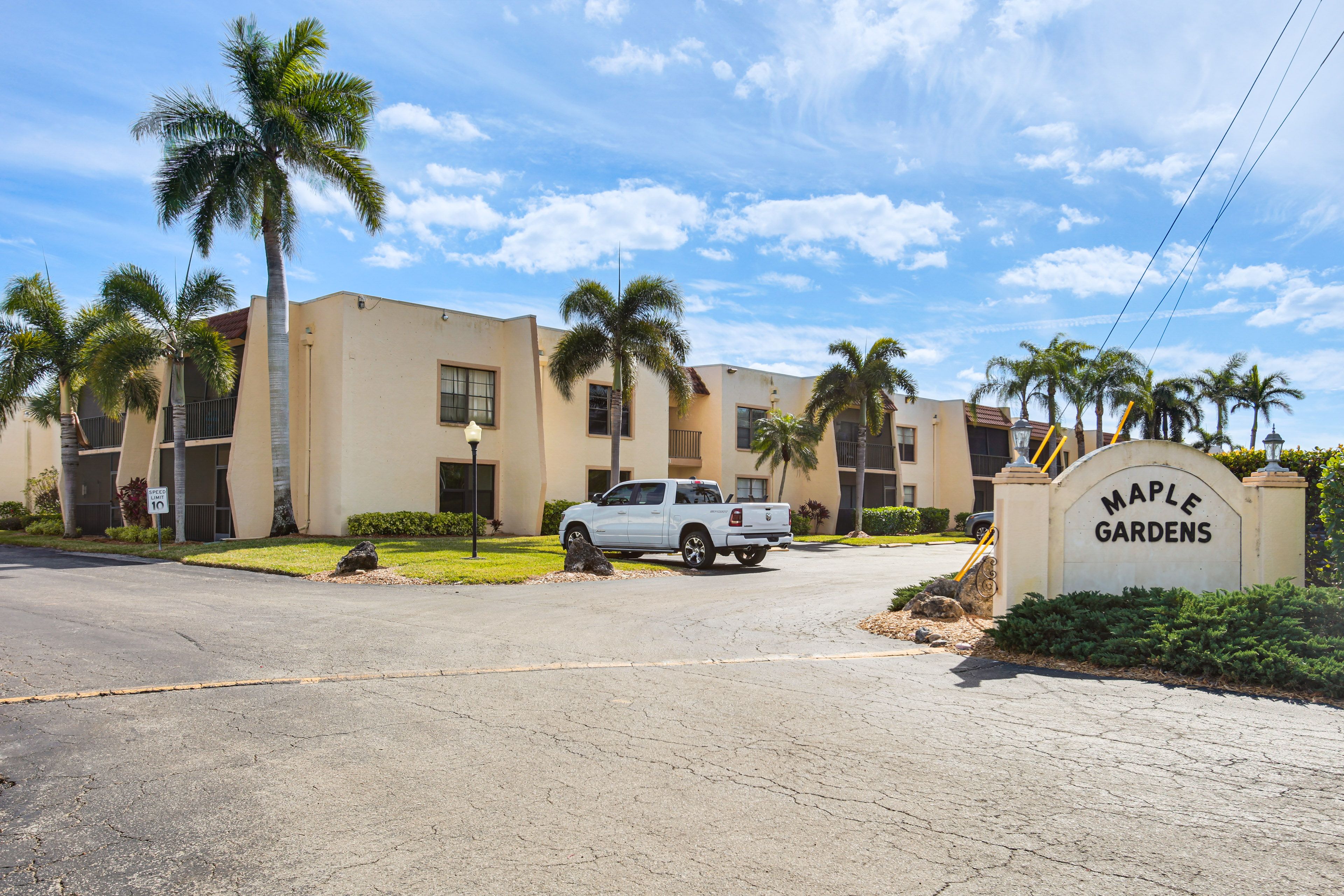 Building Exterior | Designated Parking Spot (1 Vehicle) | Guest Parking