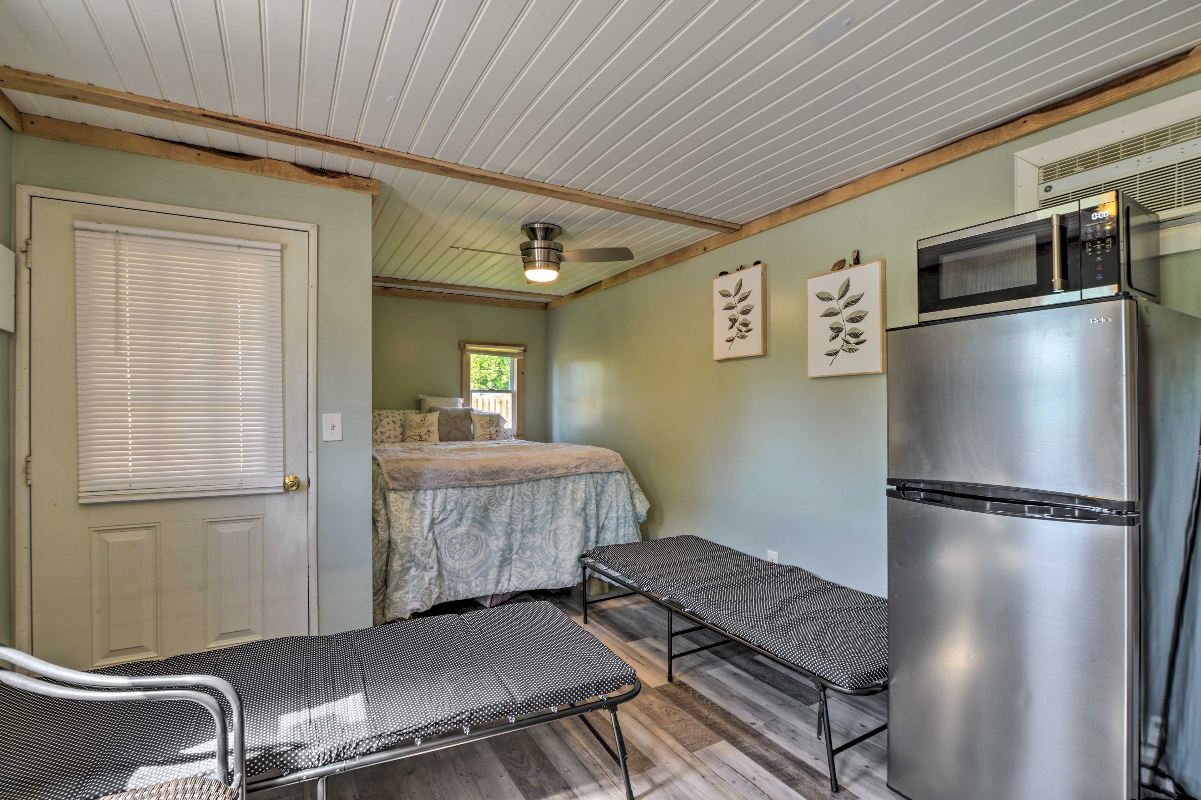 Sleeping Area | Queen Bed | 2 Twin Cots | Linens Provided