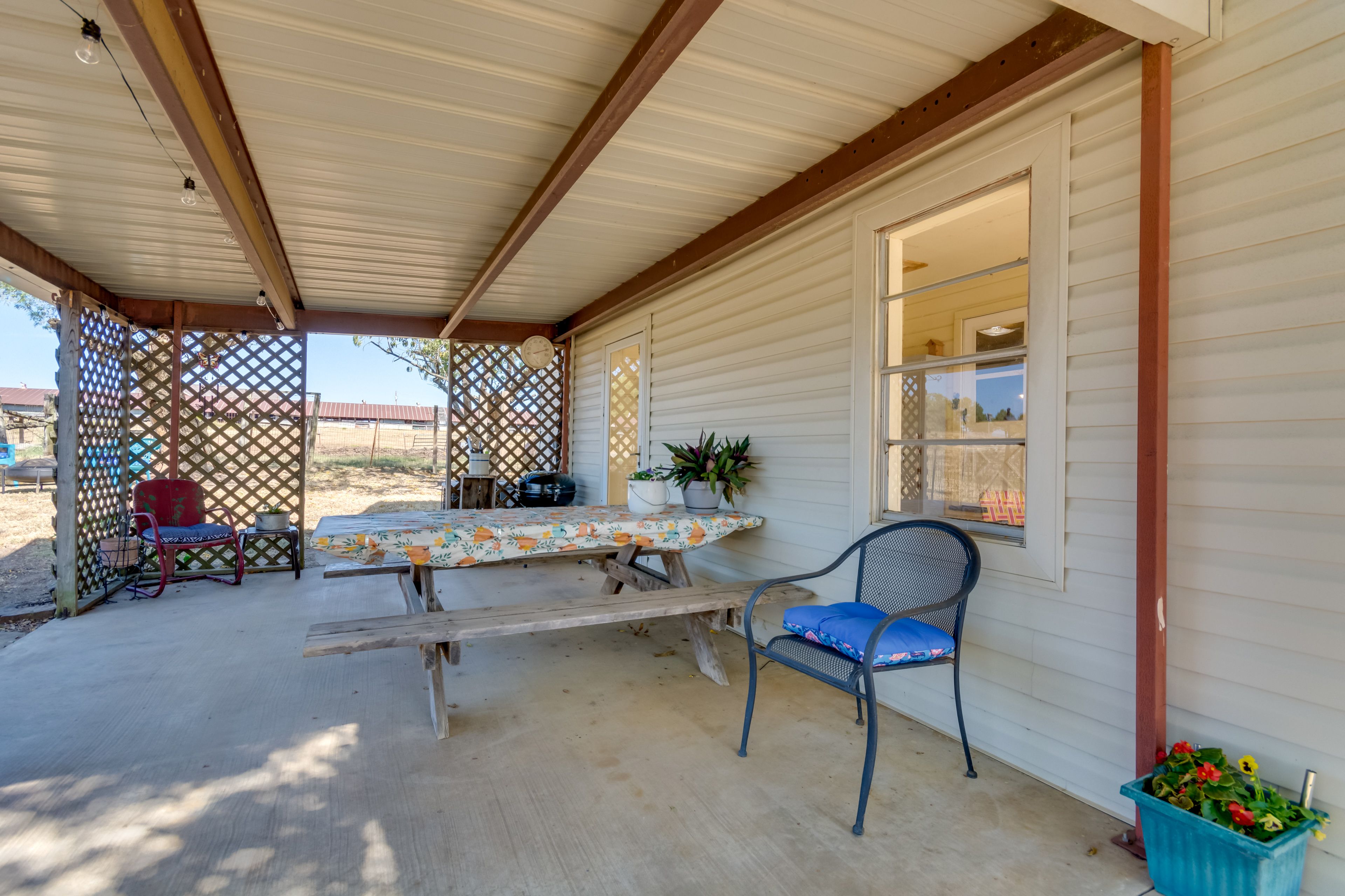 Covered Patio | Outdoor Dining Area | Charcoal Grill