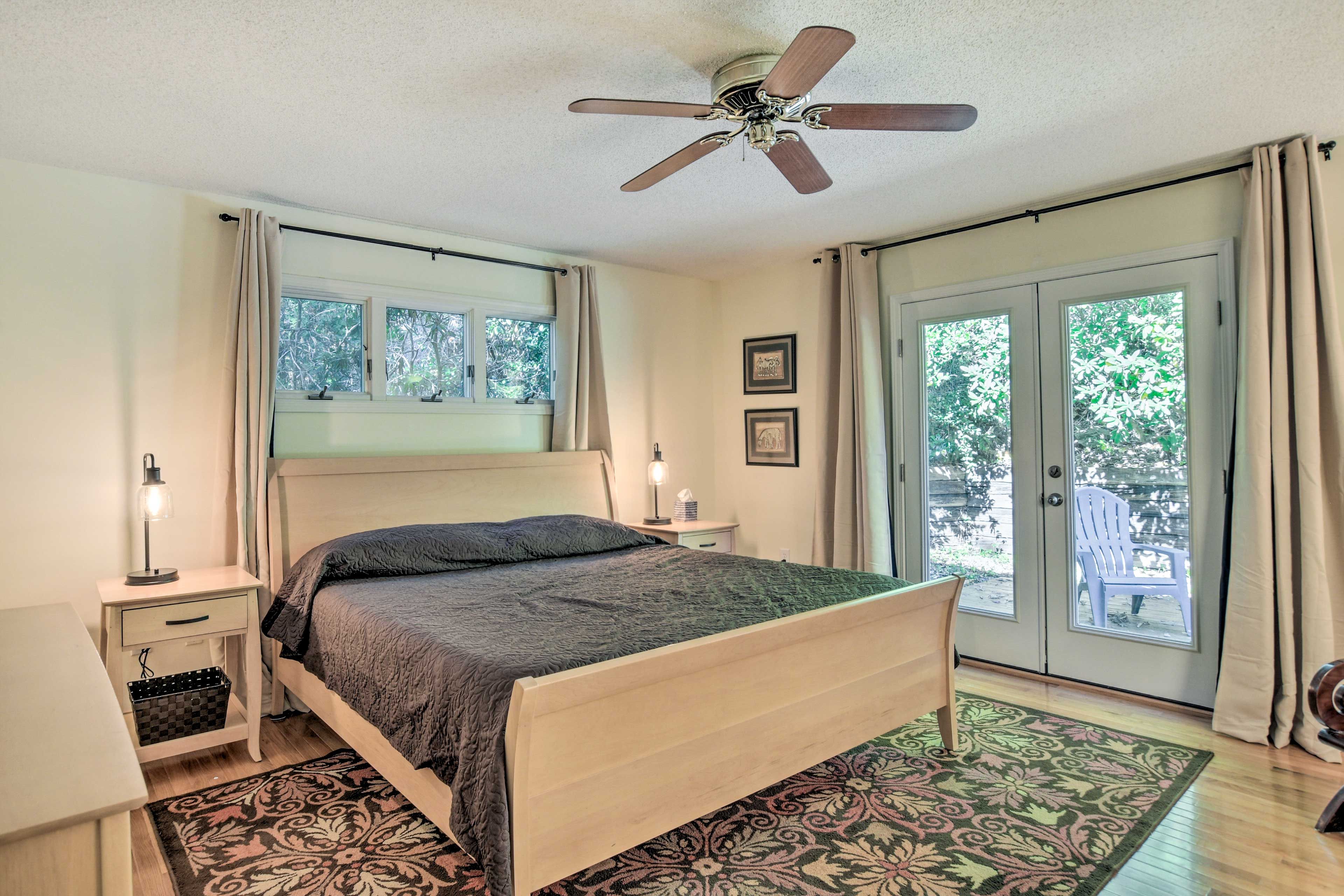 Bedroom 1 | King Bed | Dresser | Seating | Deck Access | En-Suite Bathroom