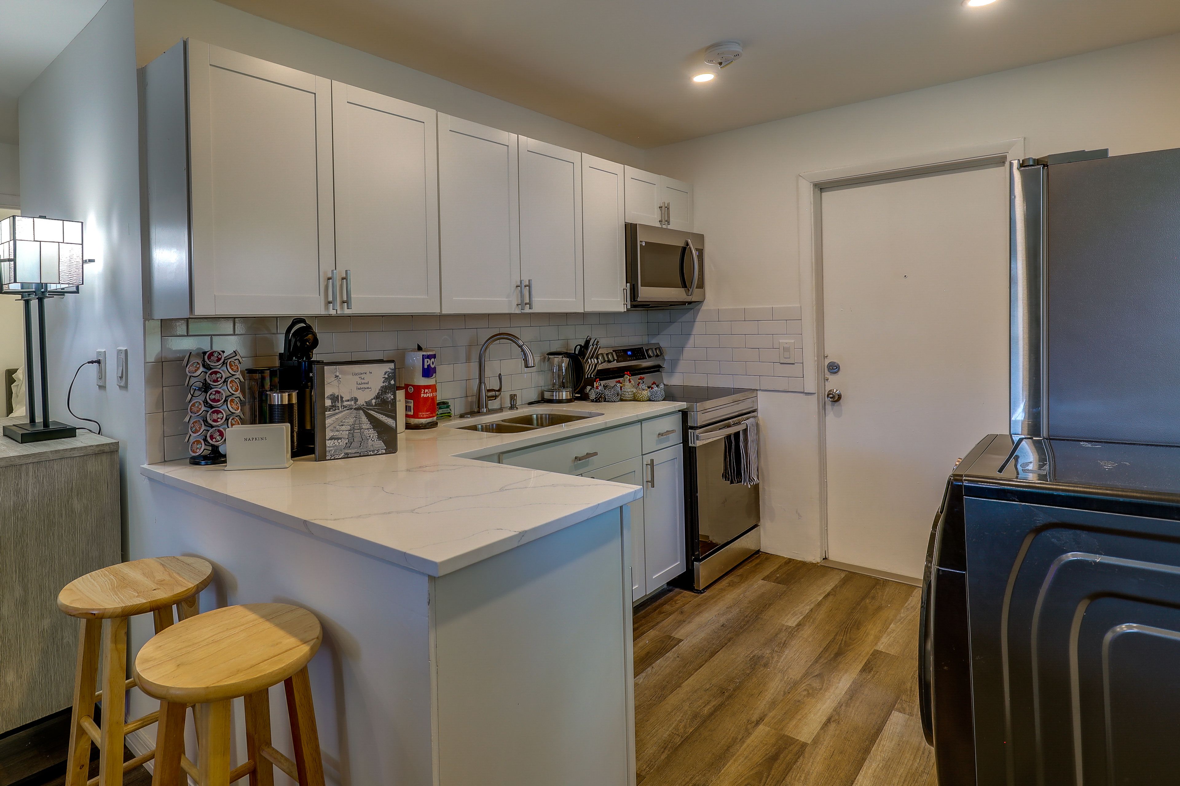 Kitchen | Bar Seating | Ice Maker | Dishware & Flatware | Cooking Basics