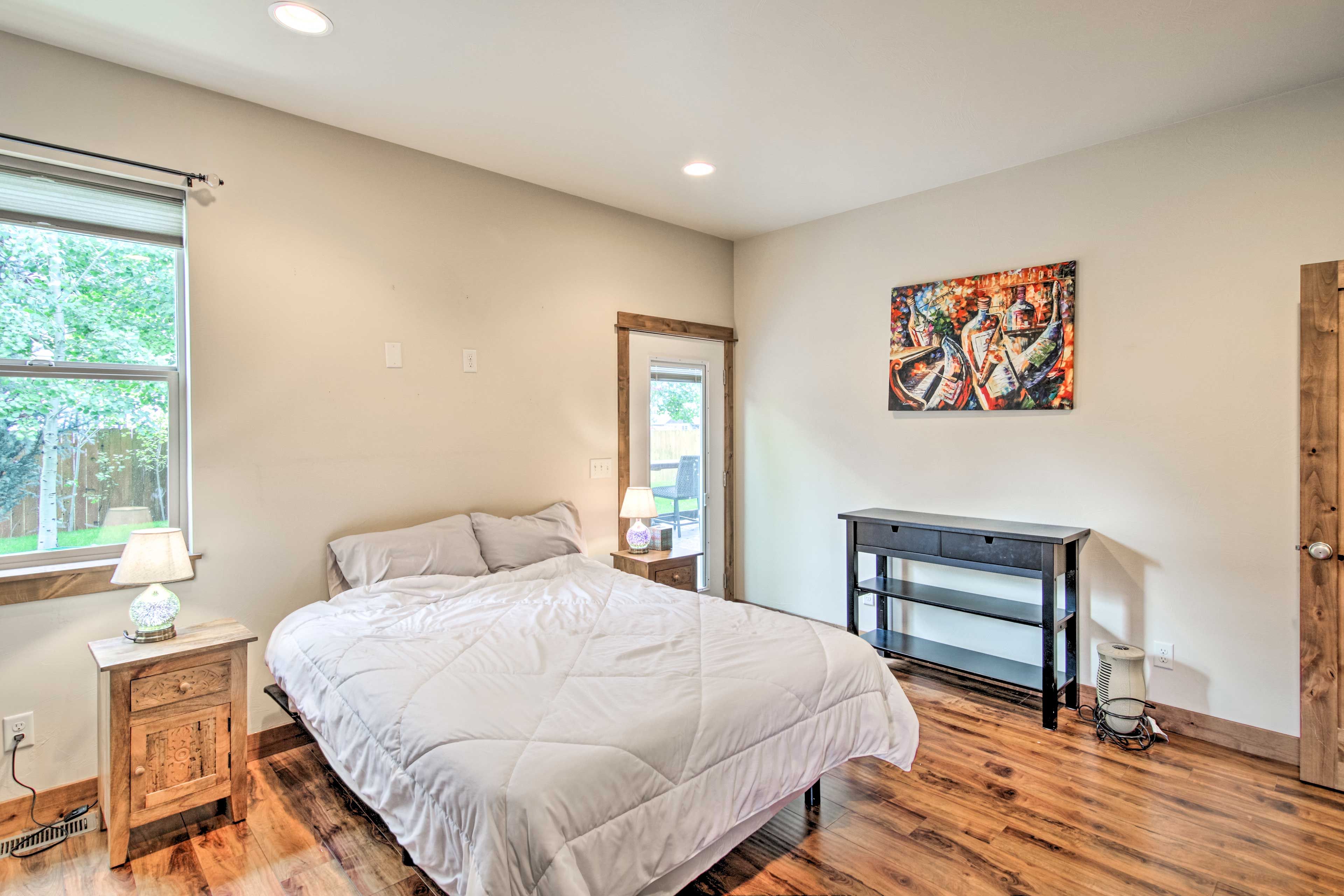 Bedroom 1 | 1st Floor | Queen Bed | Dresser | En-Suite Bathroom