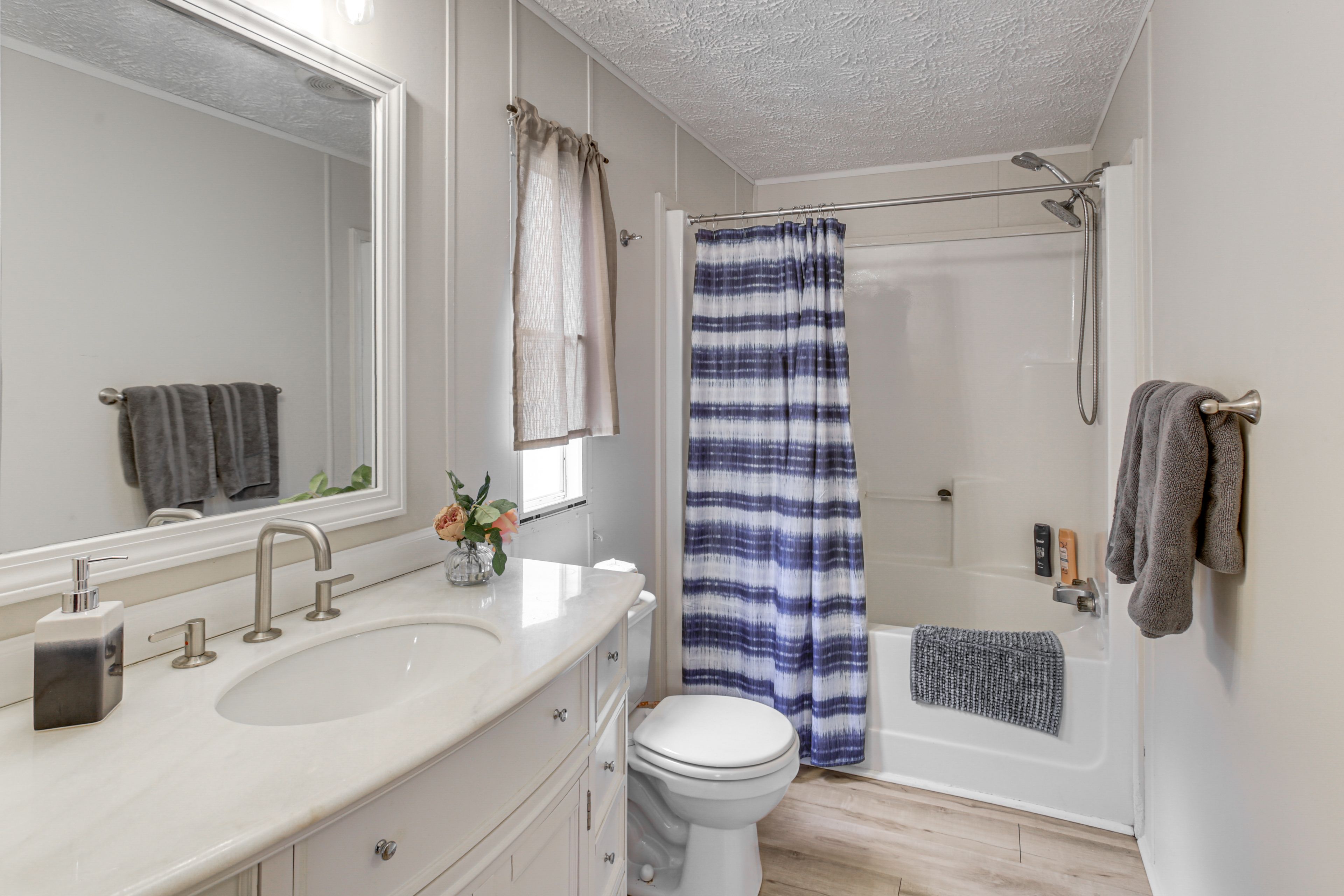 En-Suite Bathroom | Towels & Linens Provided
