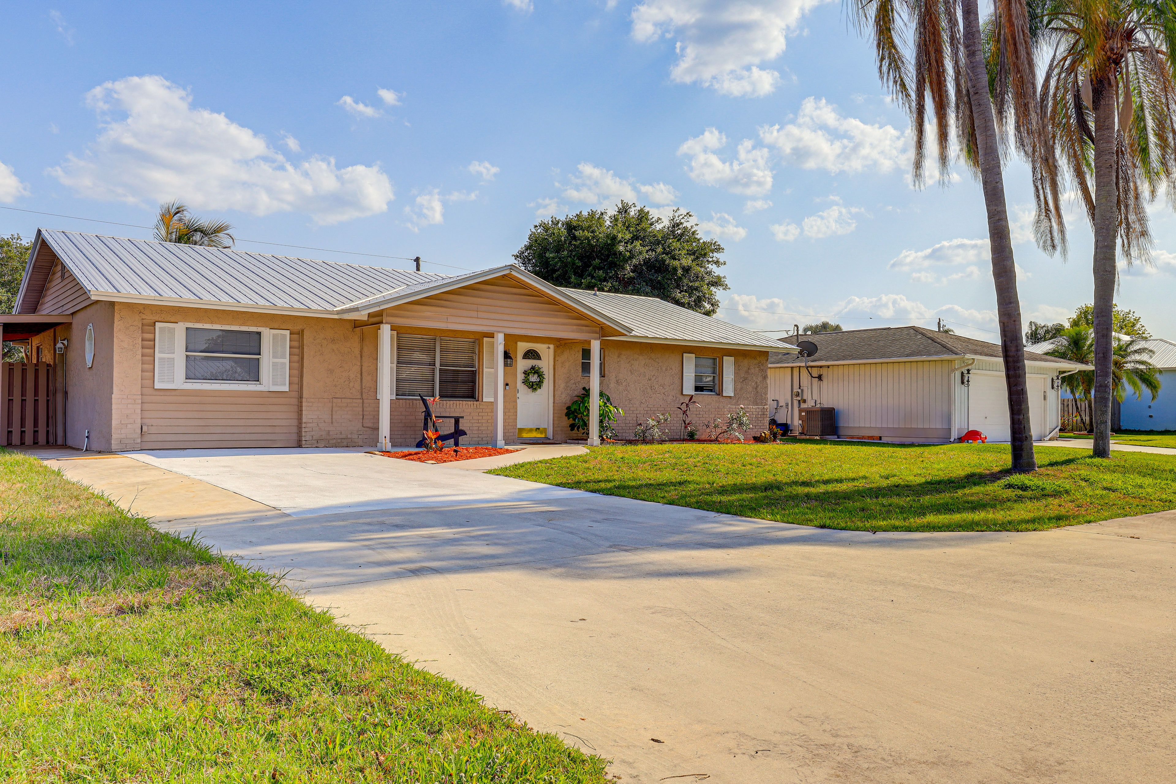 Exterior | Single-Story Home | Fenced Backyard