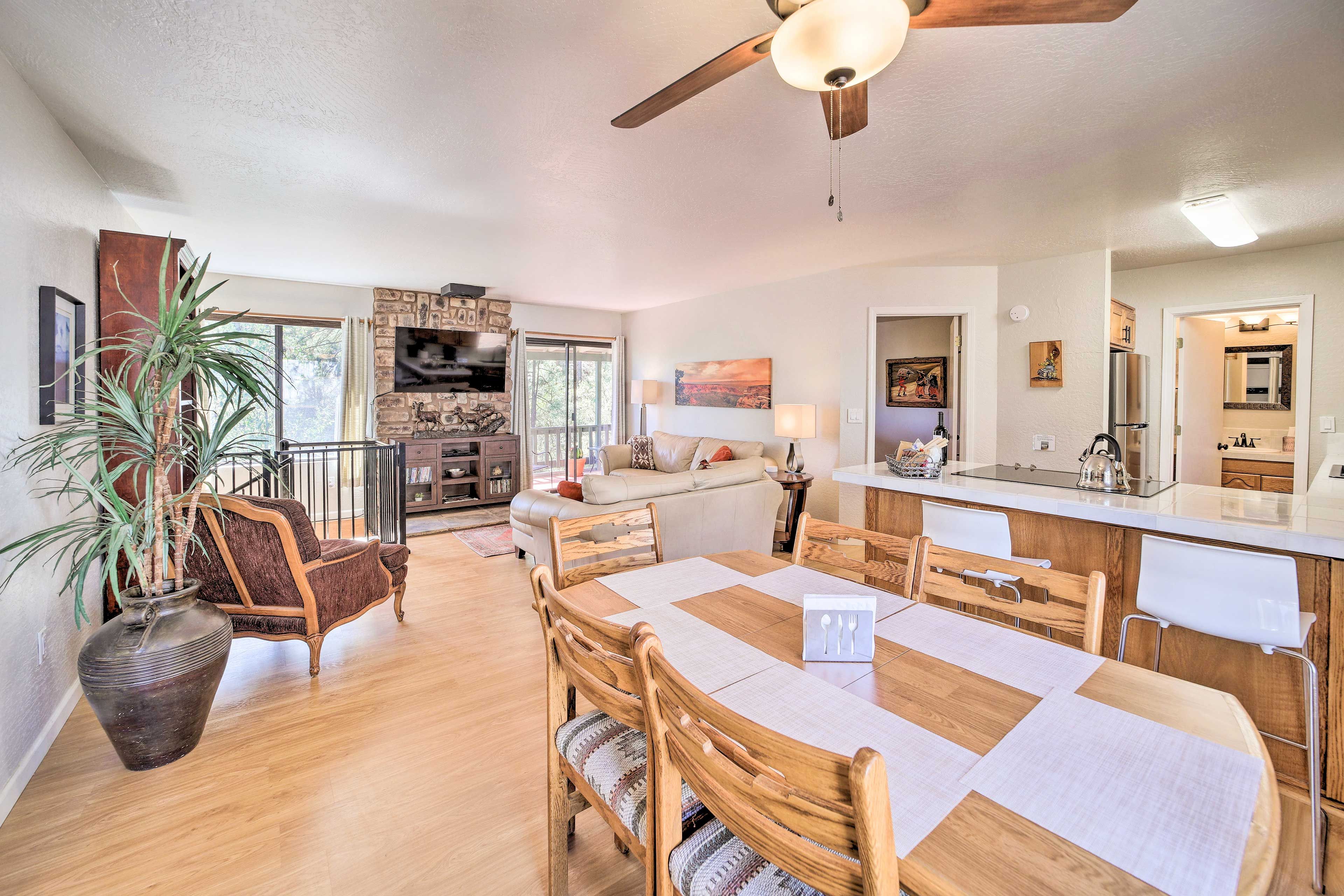 Dining Area | Dishware & Flatware Provided | Breakfast Bar w/ Additional Seating