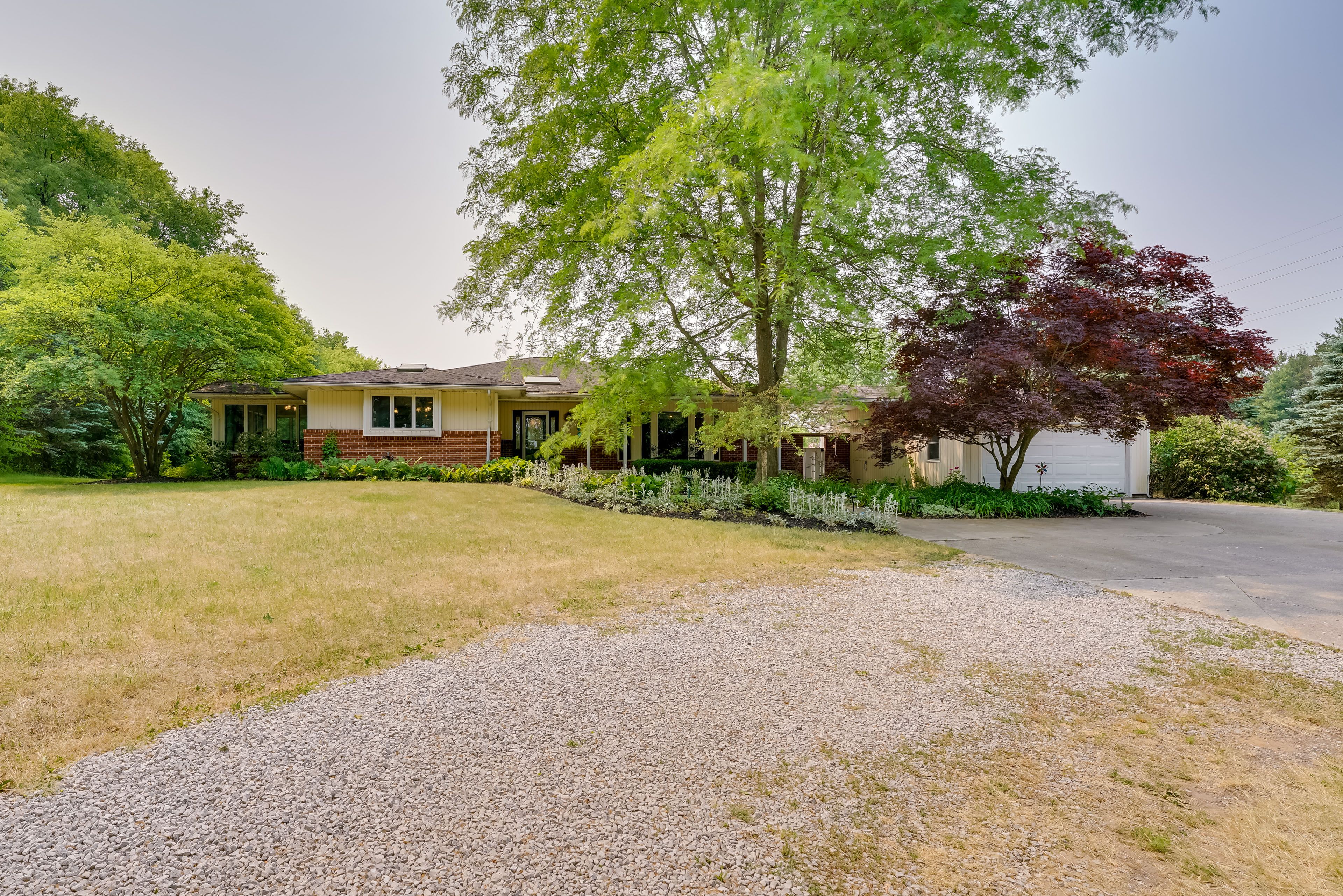 Property Exterior | Driveway (4 Vehicles) | RV/Trailer Parking Allowed On-Site