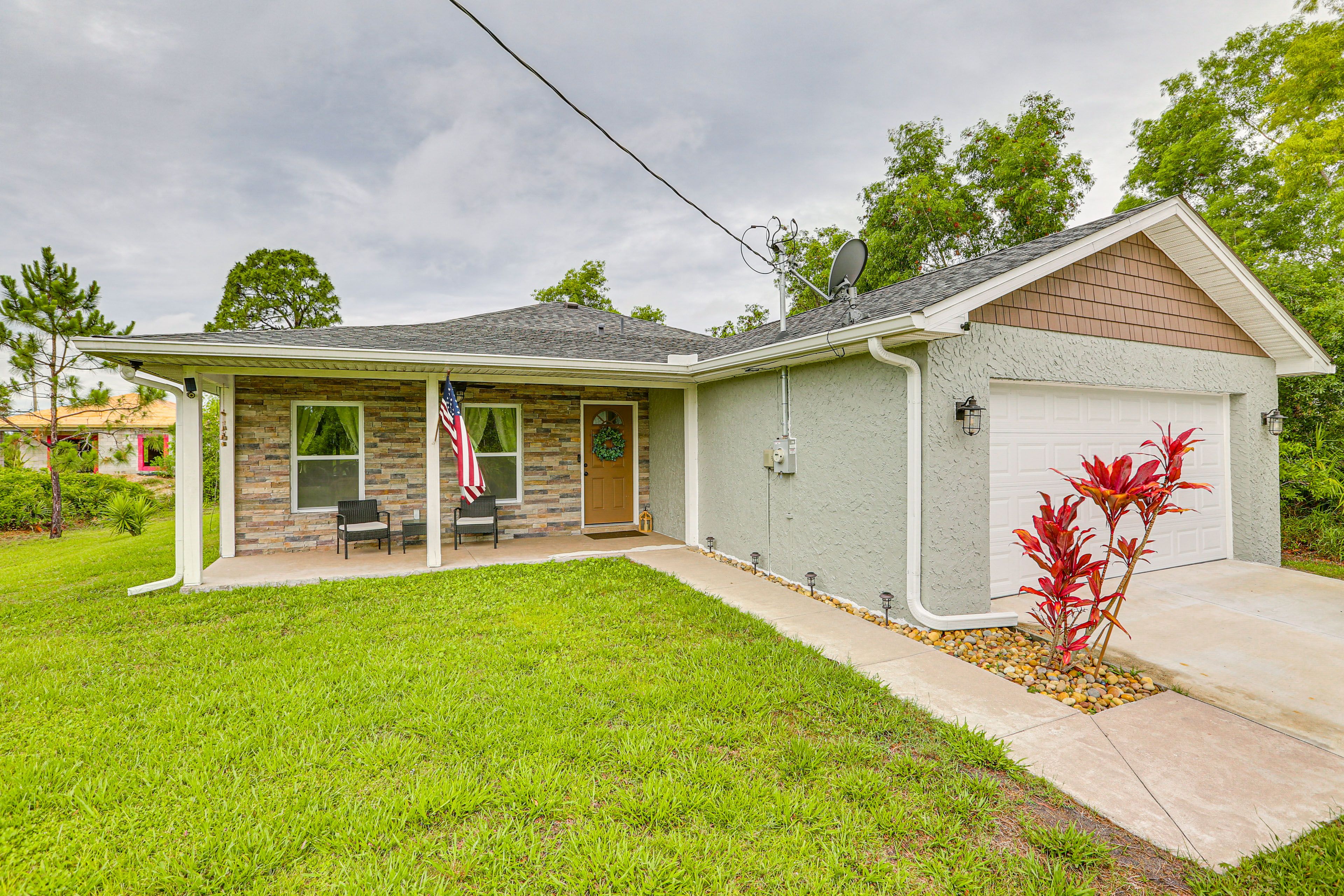Exterior | Driveway (4 Vehicles) | Garage Off-Limits