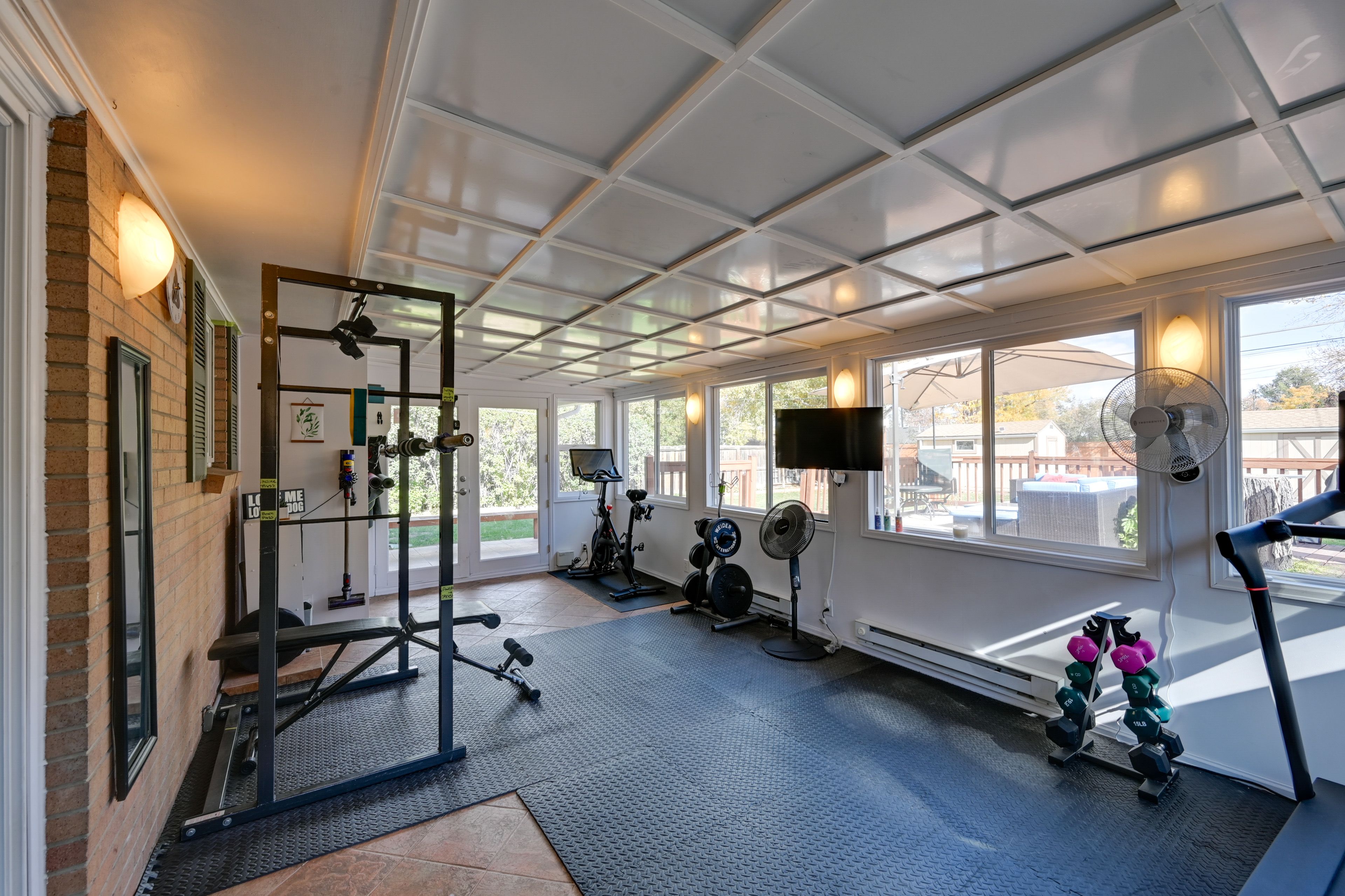 Sunroom Gym | Bedroom/Full Bathroom on 1st Floor