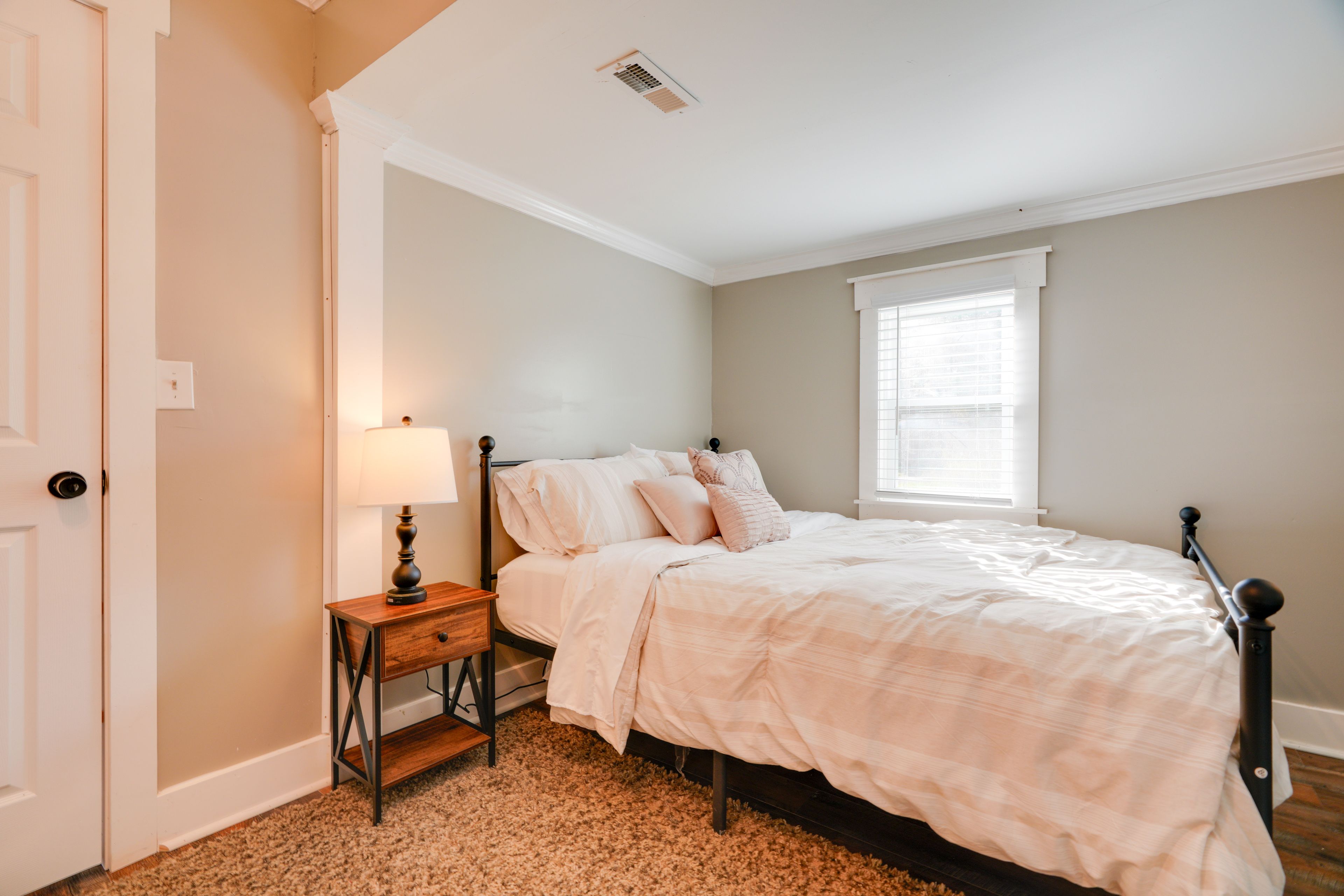 Bedroom 1 | Queen Bed | Linens Provided | Shared En-Suite Bathroom