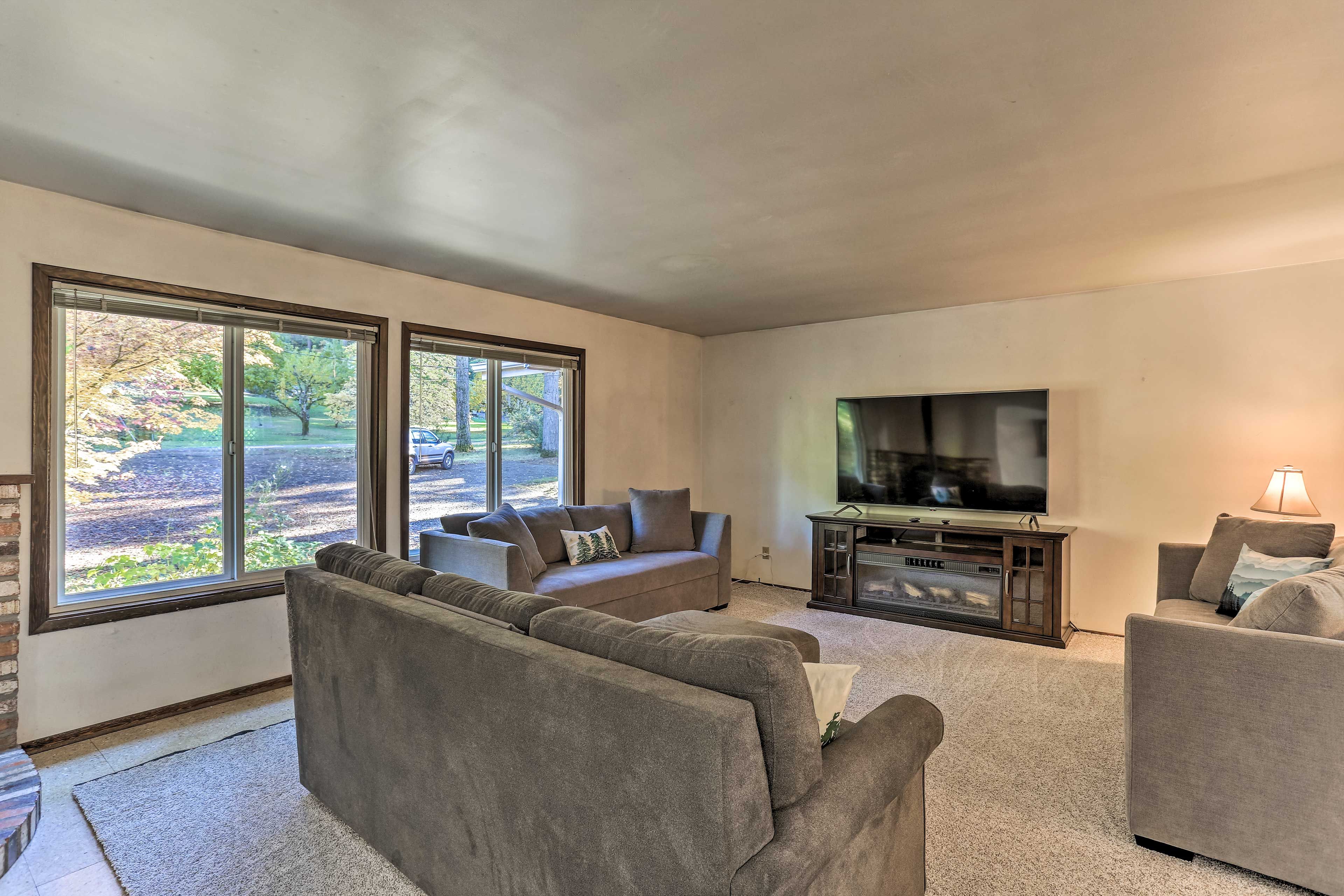 Living Area | Smart TV | Electric Fireplace | Wood-Burning Stove