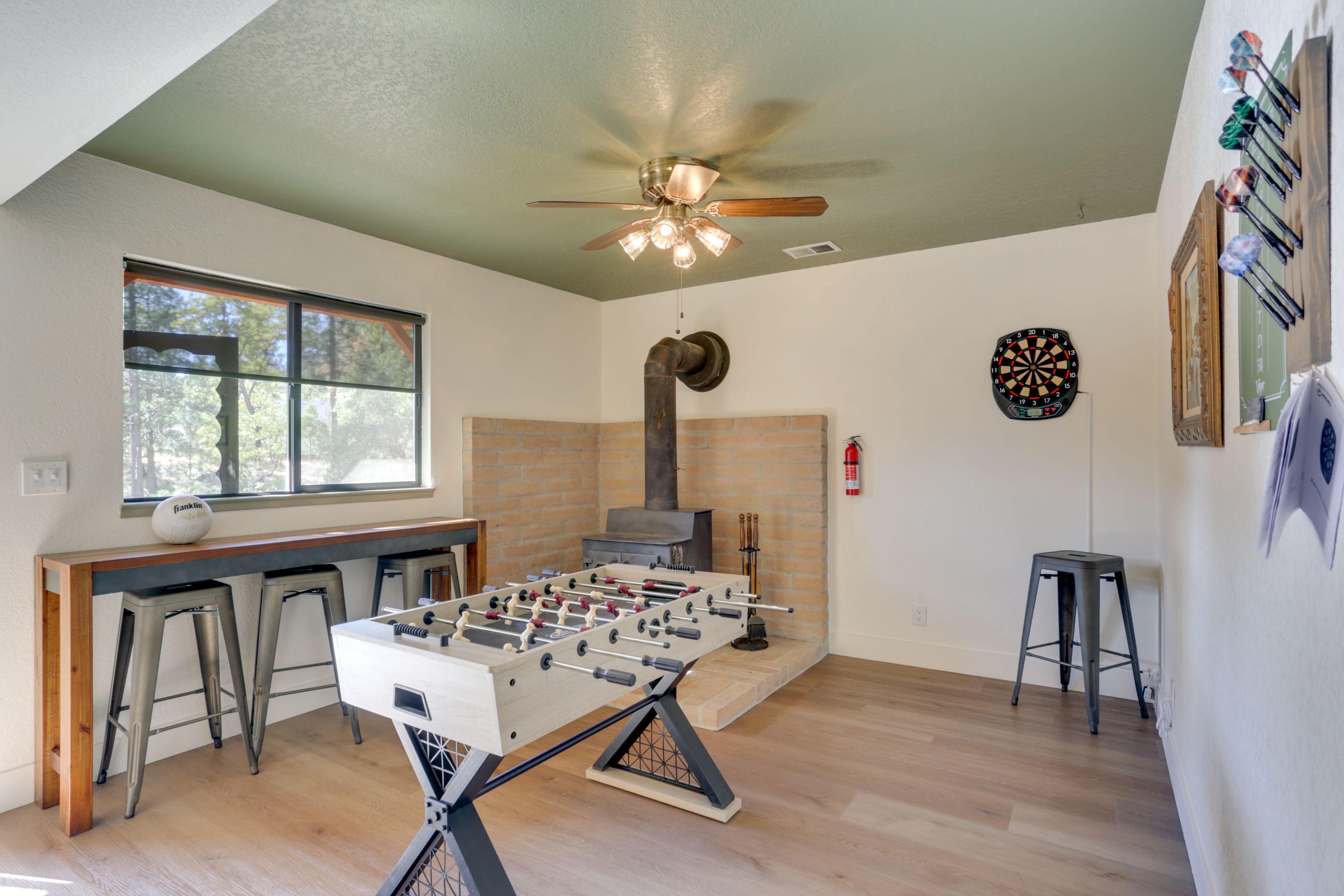 Game Room | Foosball Table | Dartboard | Wood-Burning Stove | Volleyball