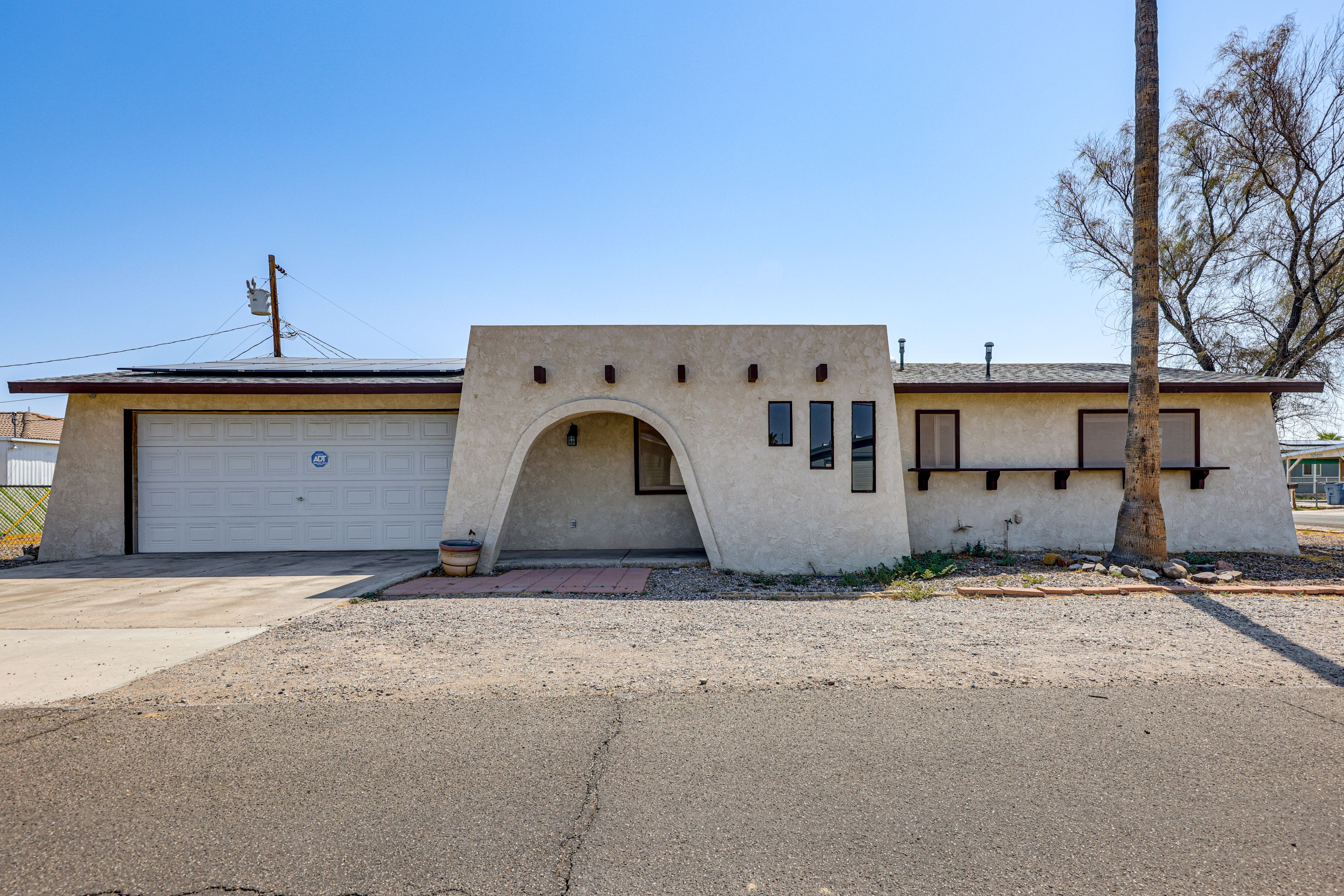 Home Exterior | Fenced-In Backyard | Walking Distance to Colorado River