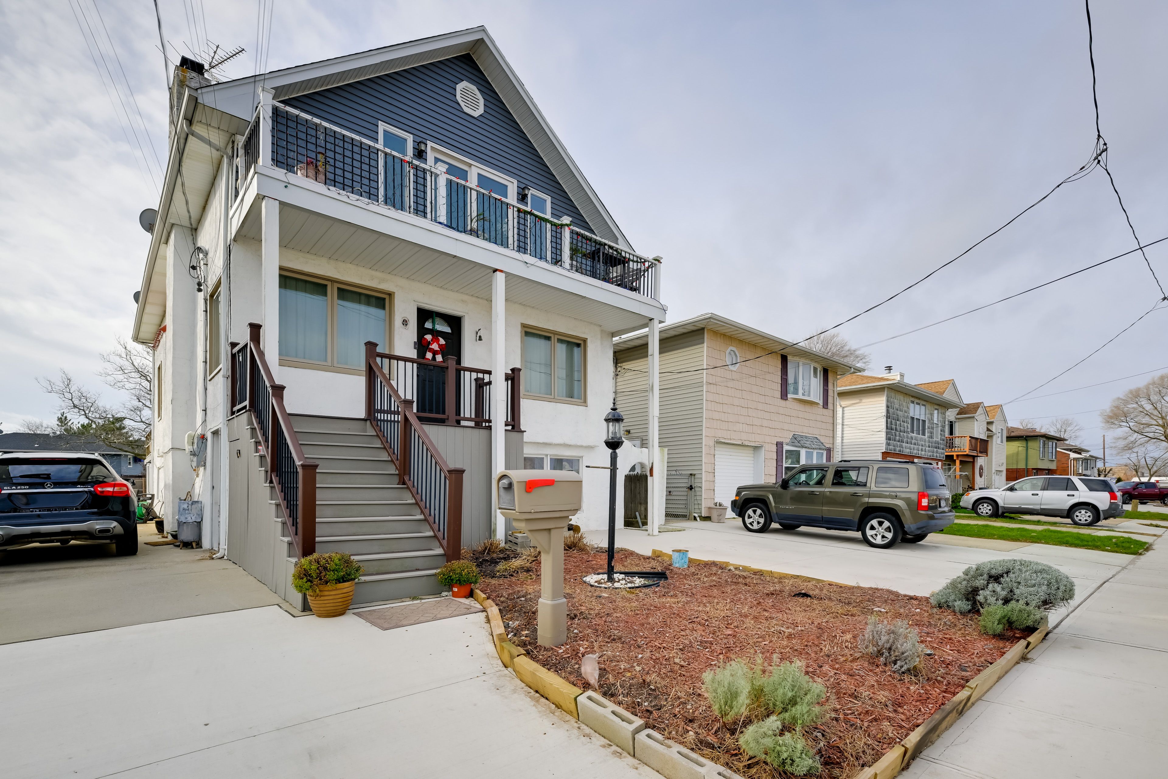 Home Exterior | Lower-Level Unit | Covered Parking (1 Vehicle)