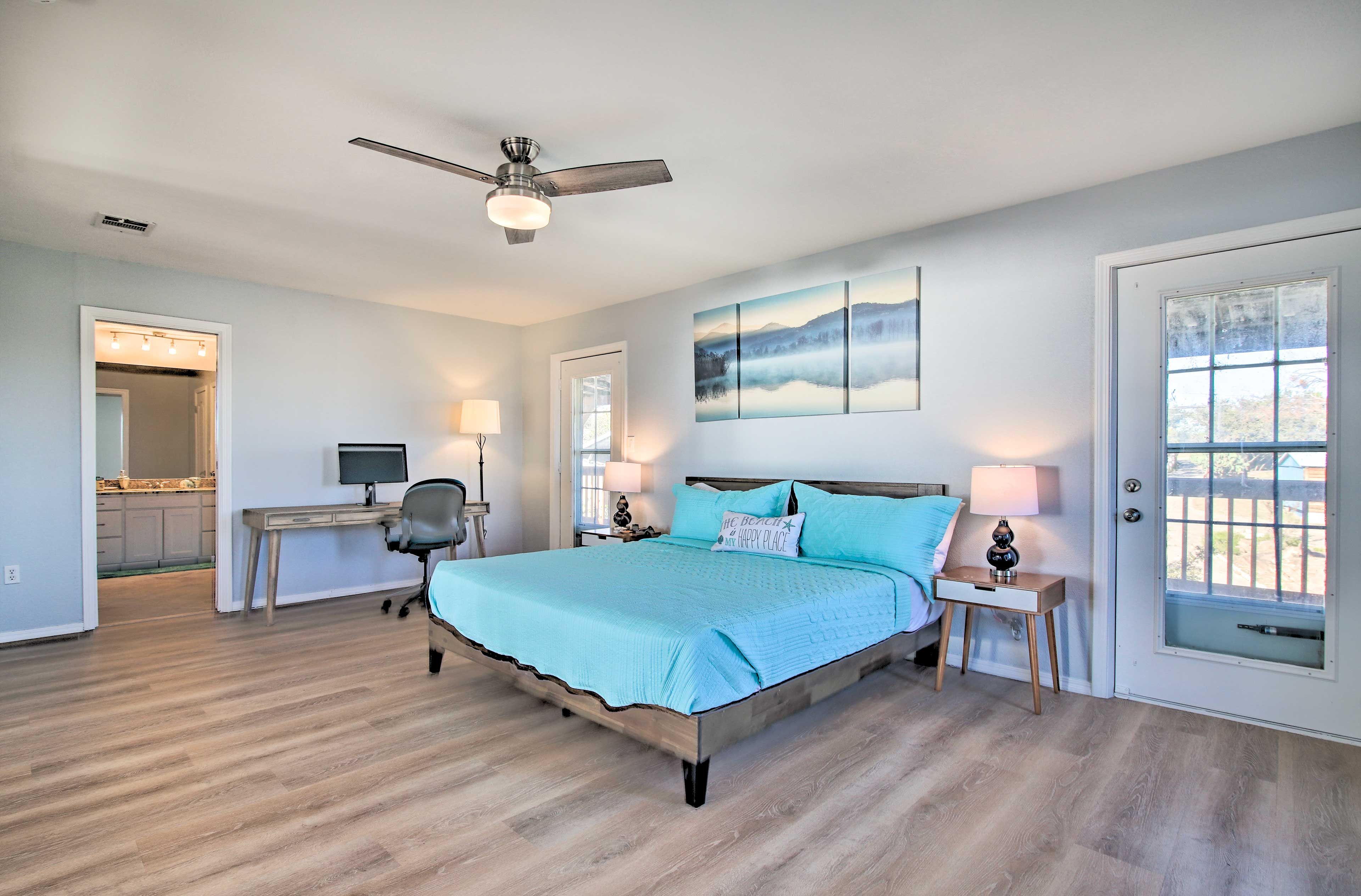 Bedroom 1 | California King Bed | Linens & Towels | Balcony Access | WFH Desk