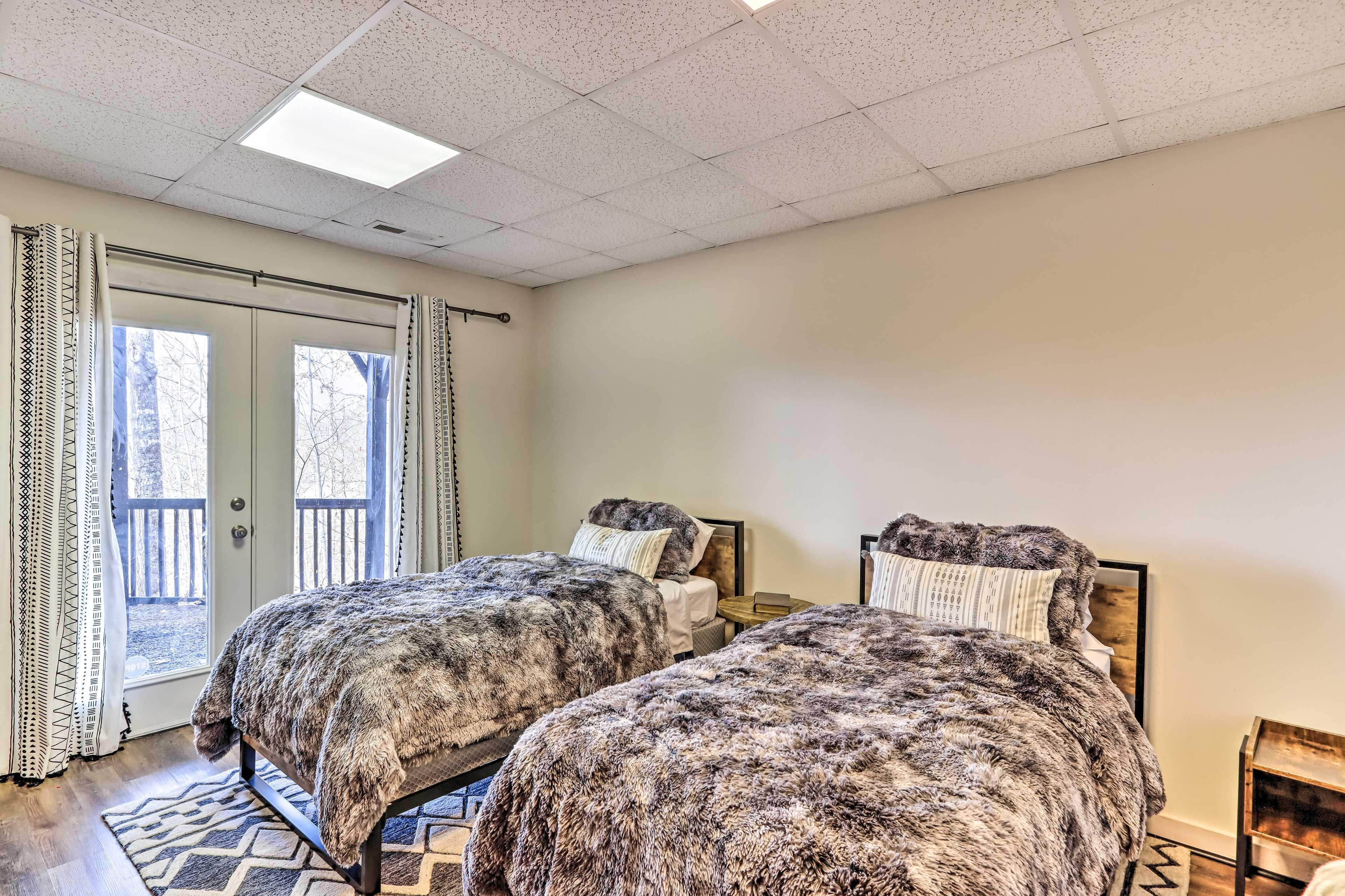 Bedroom 1 | 2 Twin Beds | Lower Level | Patio Access | Playpen