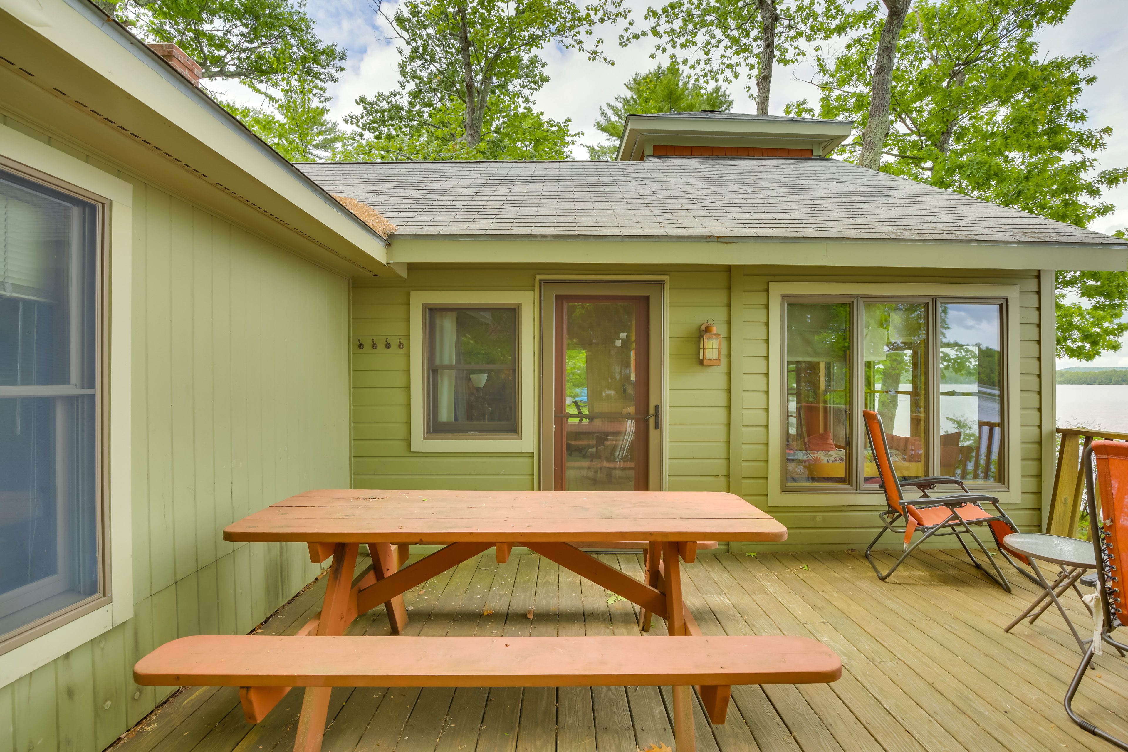 Cottage Exterior | Furnished Deck | Dining Area | Pond Views