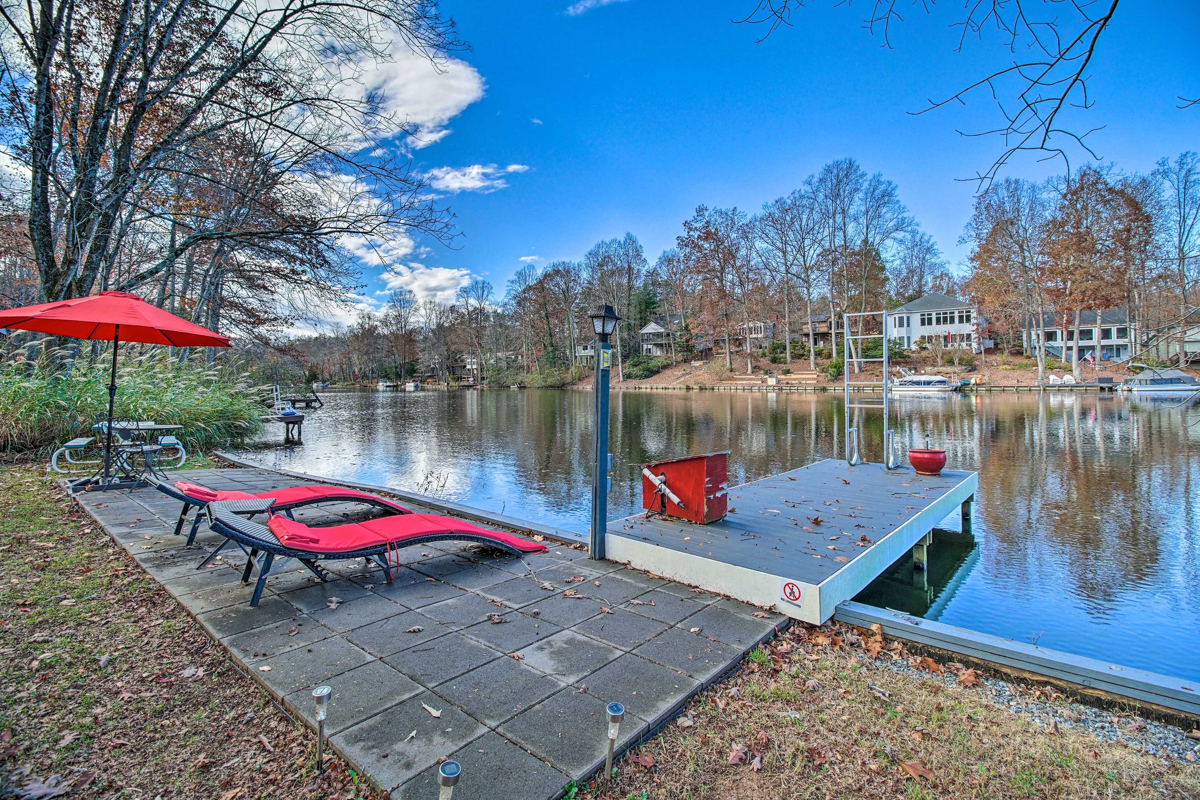Lakefront Patio | Lounge Seats | Stand-Up Paddleboard