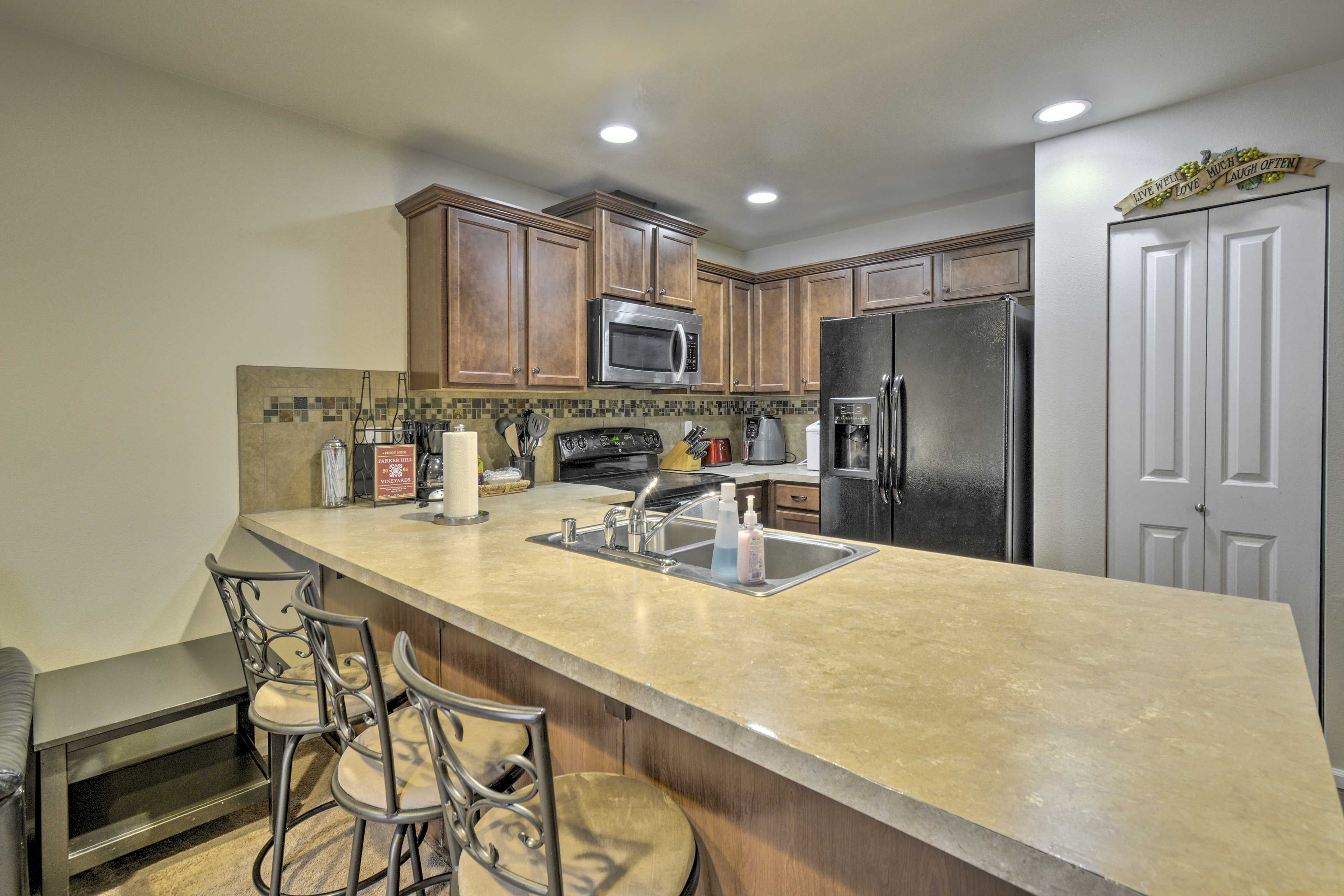 Kitchen w/ Breakfast Bar | Main Level