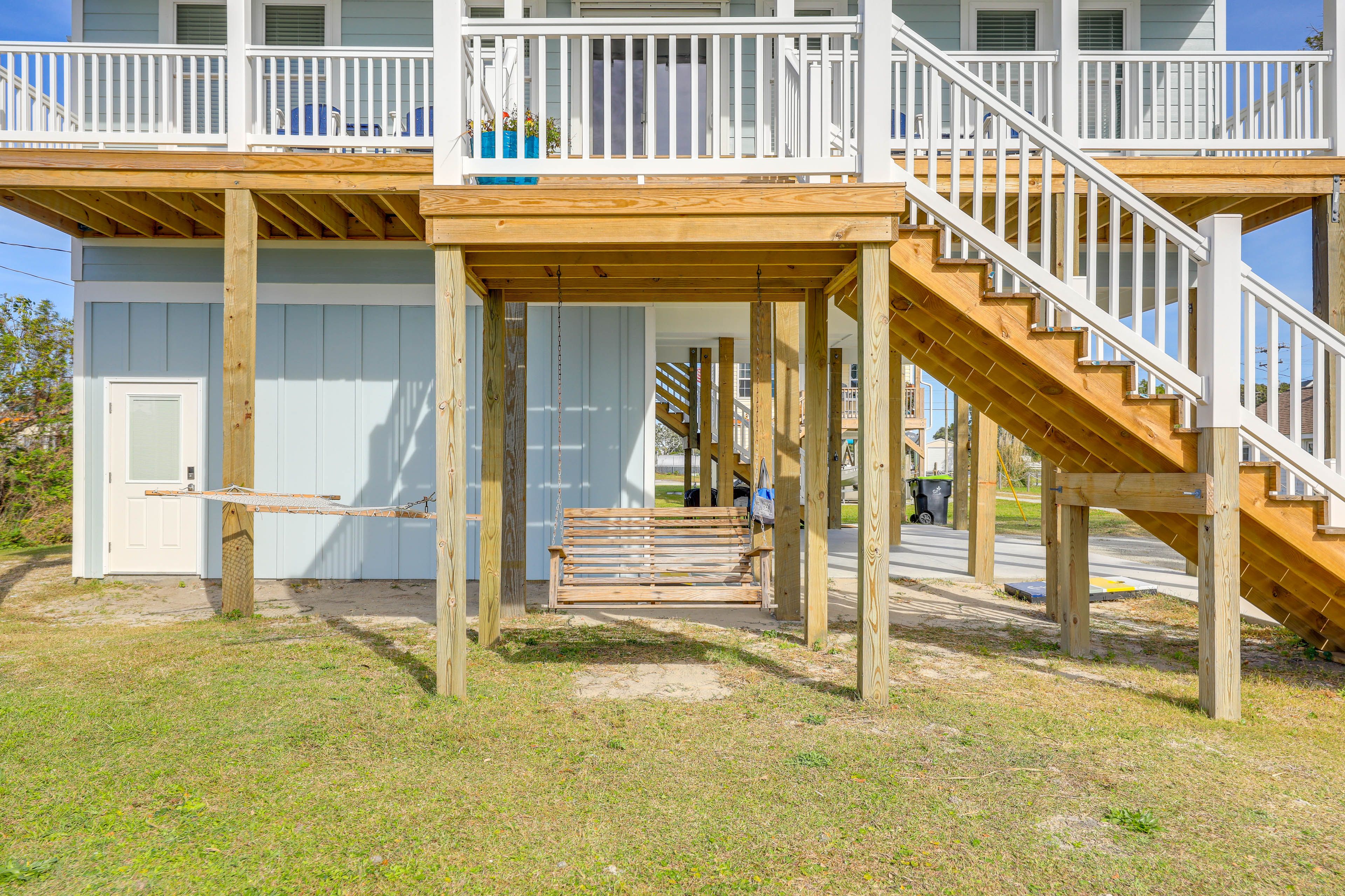 Covered Patio | Swing | Cornhole | Hammock | Charcoal Grill