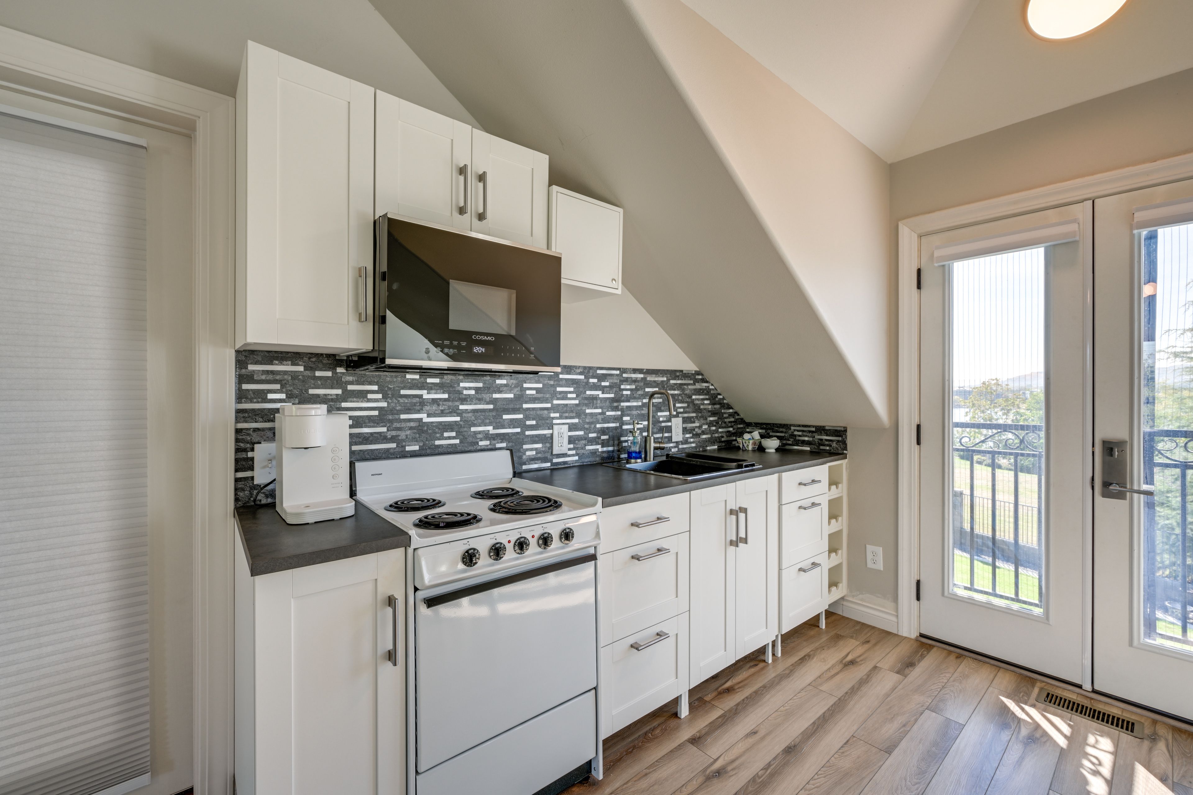 Kitchen | Stove/Oven | Mini Fridge | Keurig Coffee Maker | Microwave