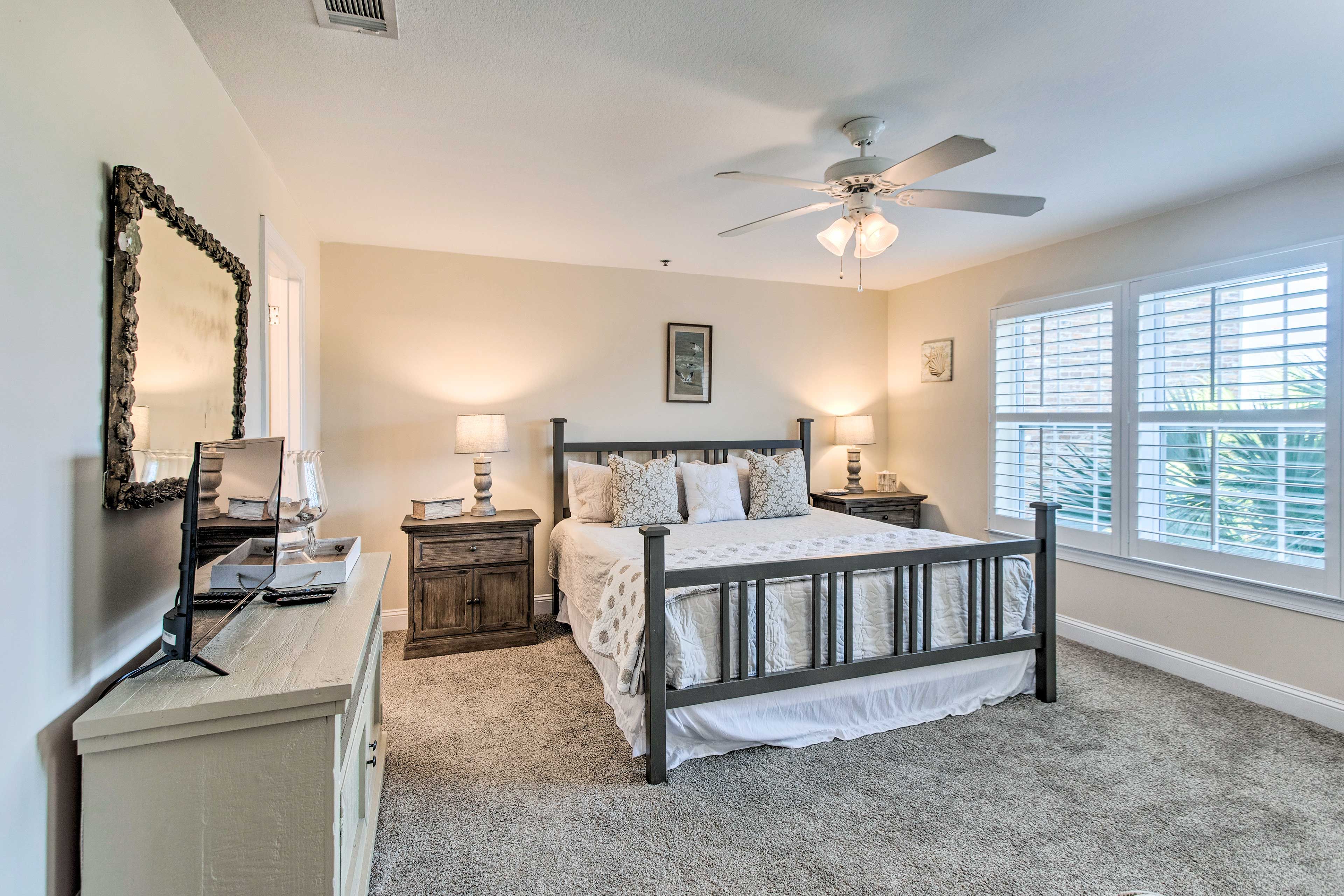 Bedroom Suite 1 | King Bed | Flat-Screen TV | Walk-In Closet