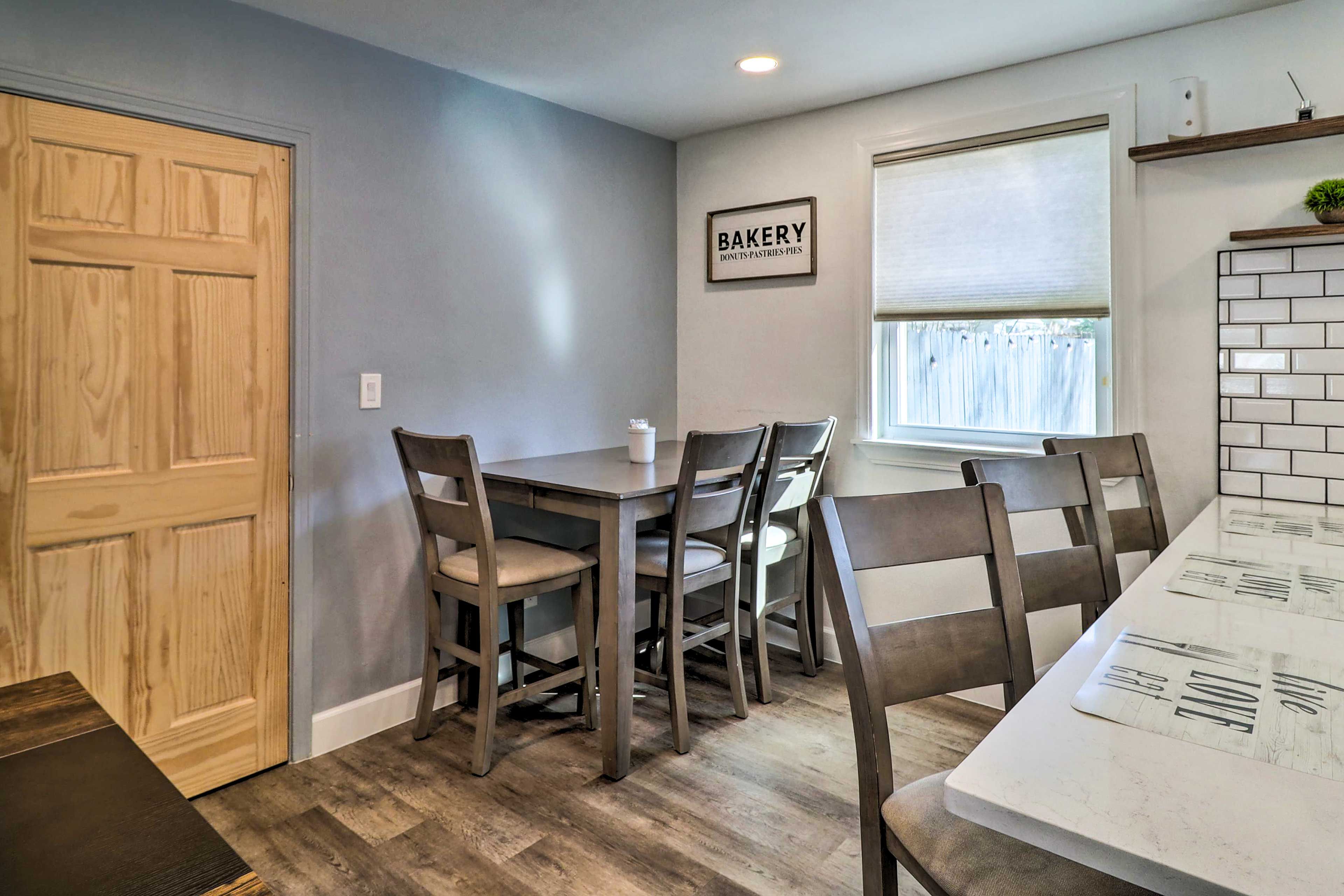 Dining Area | Dishware & Flatware Provided | Breakfast Bar w/ Additional Seating