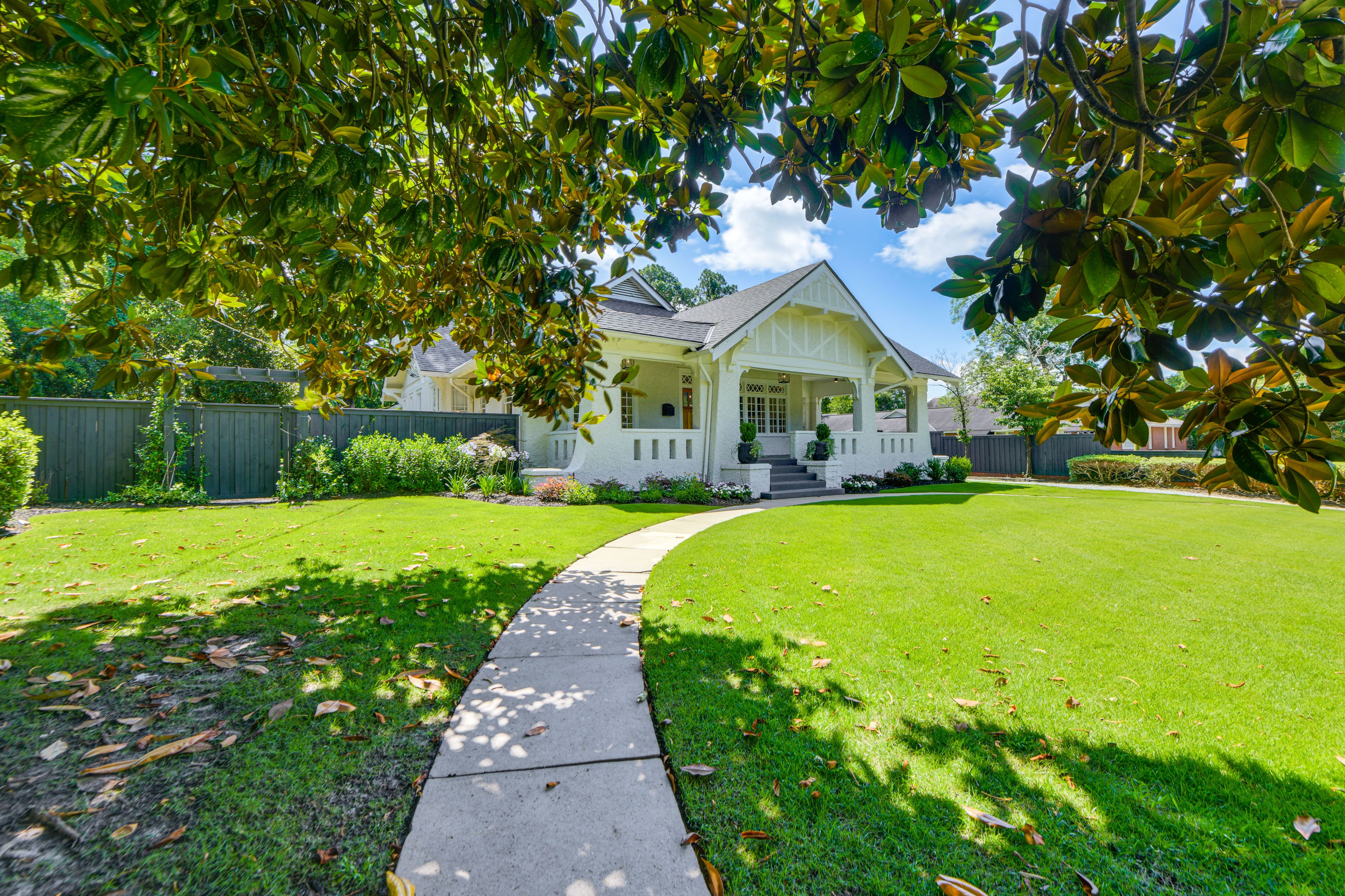 Exterior | Covered Porch w/ Seating | Spacious Yard
