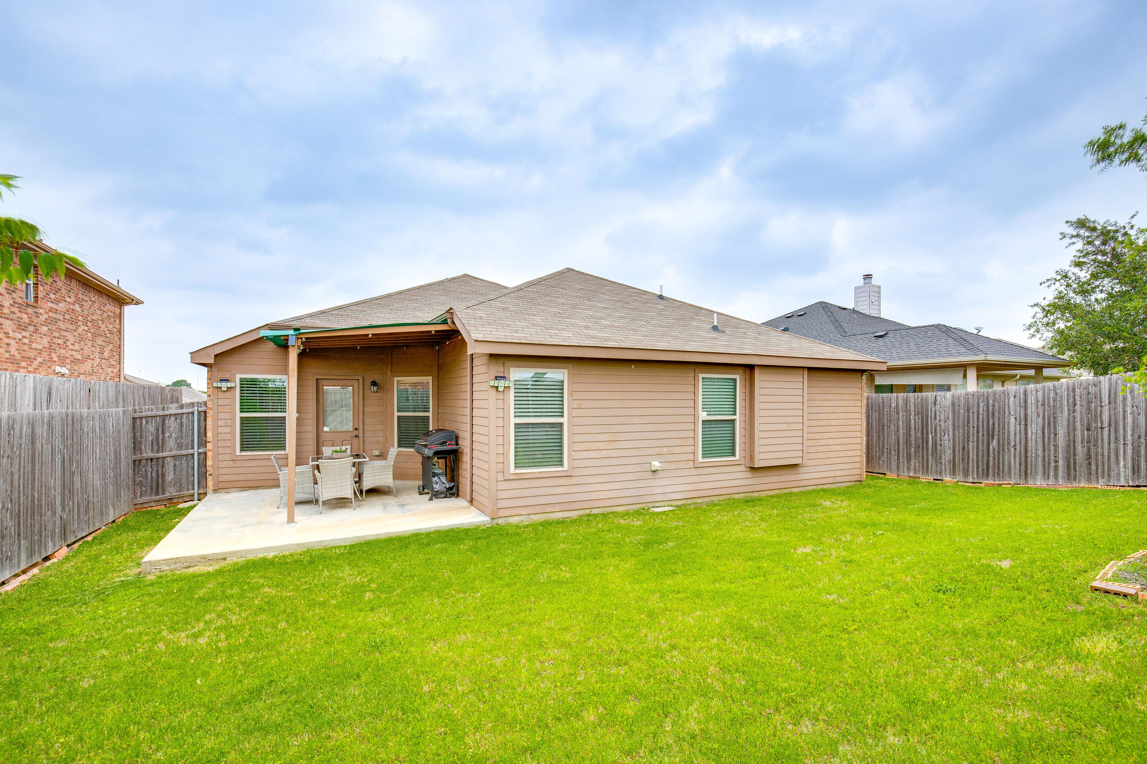 Front Exterior | Private, Fenced Backyard | 4 Exterior Security Cameras