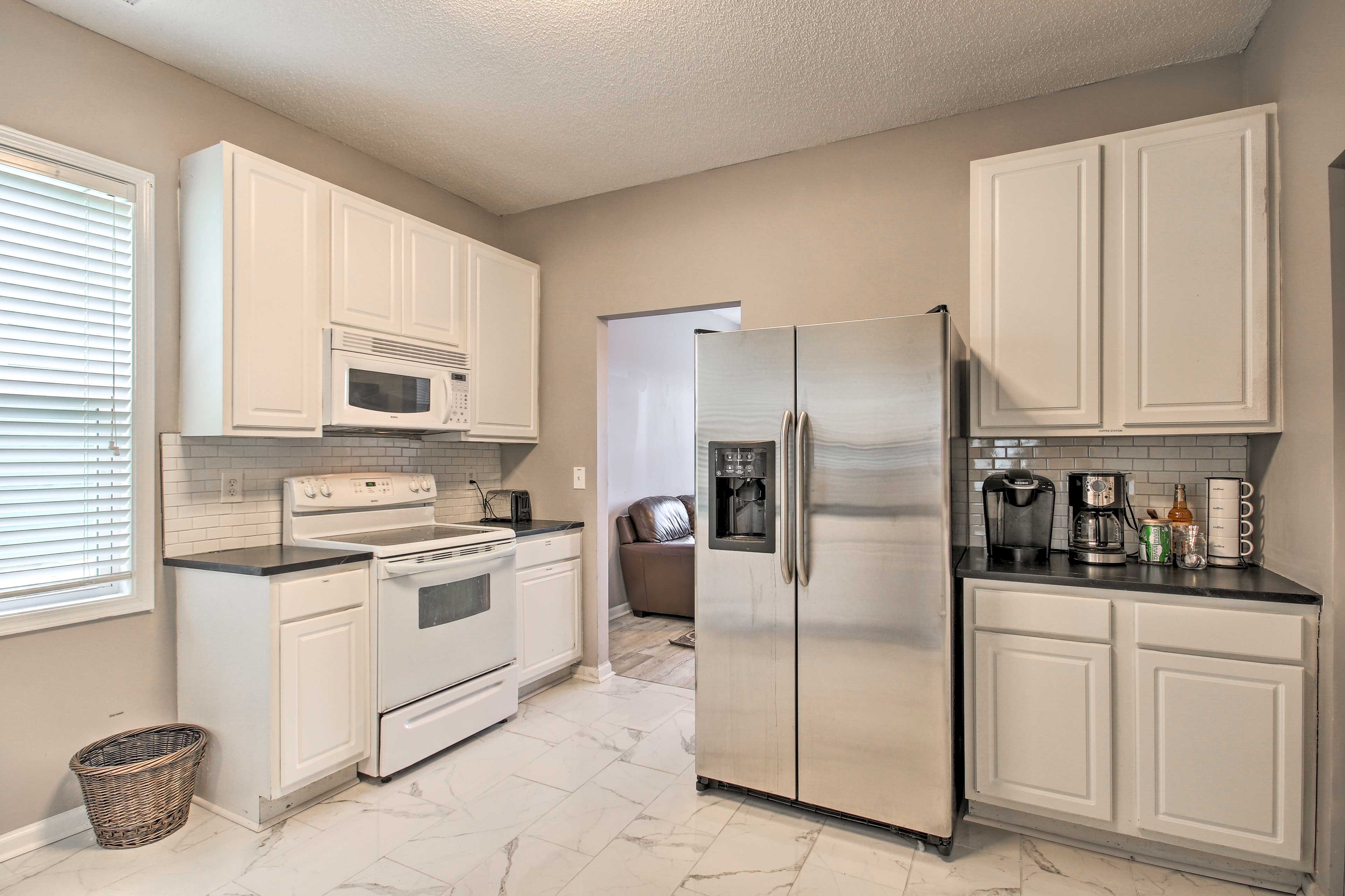 Kitchen | Free WiFi | 2nd-Floor Bedrooms/Showers | Towels & Linens