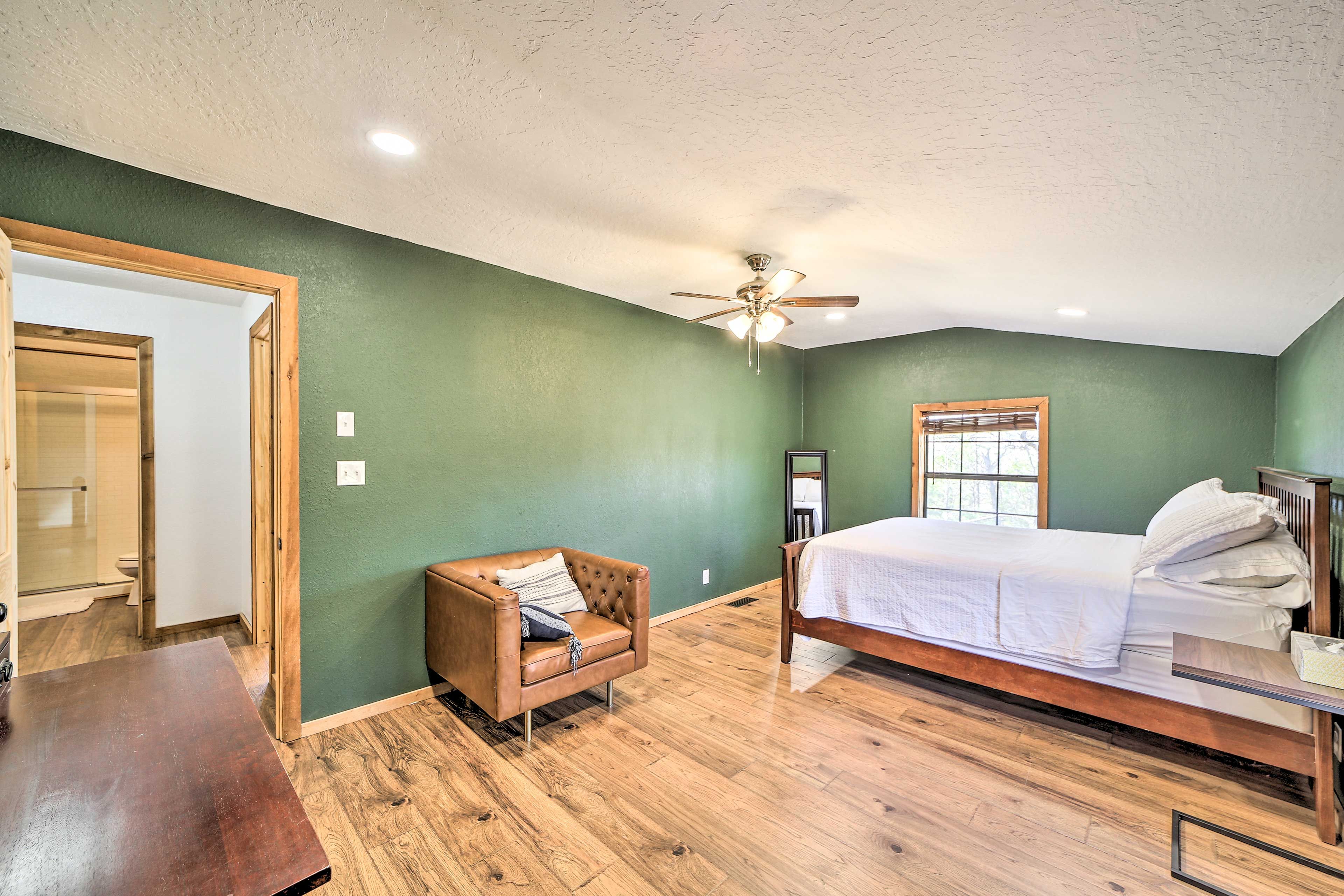 Bedroom 1 | Queen Bed | Seating | Walk-In Closet