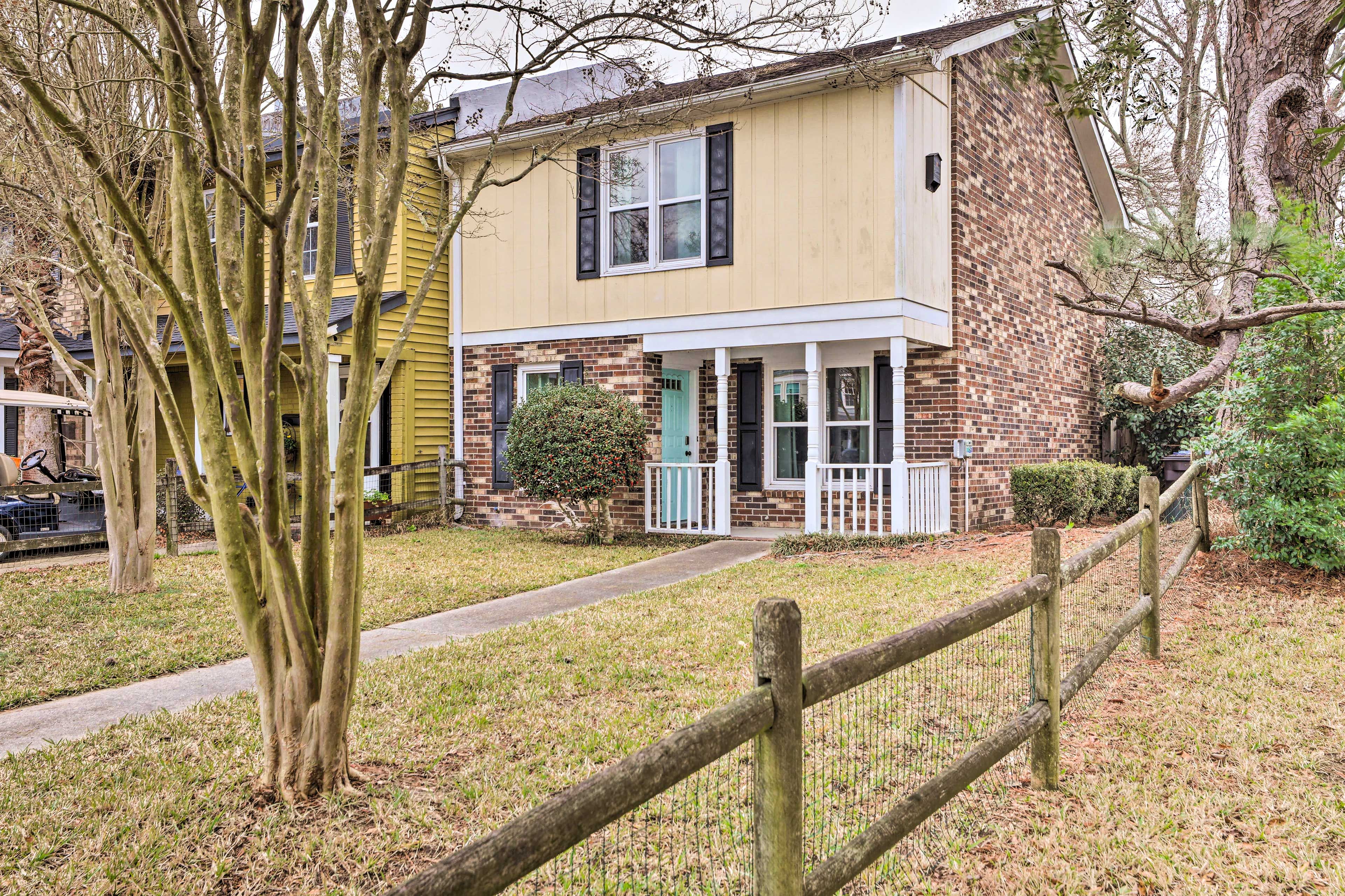 Townhome Exterior | Parking | Community Parking Lot (2 Vehicles)