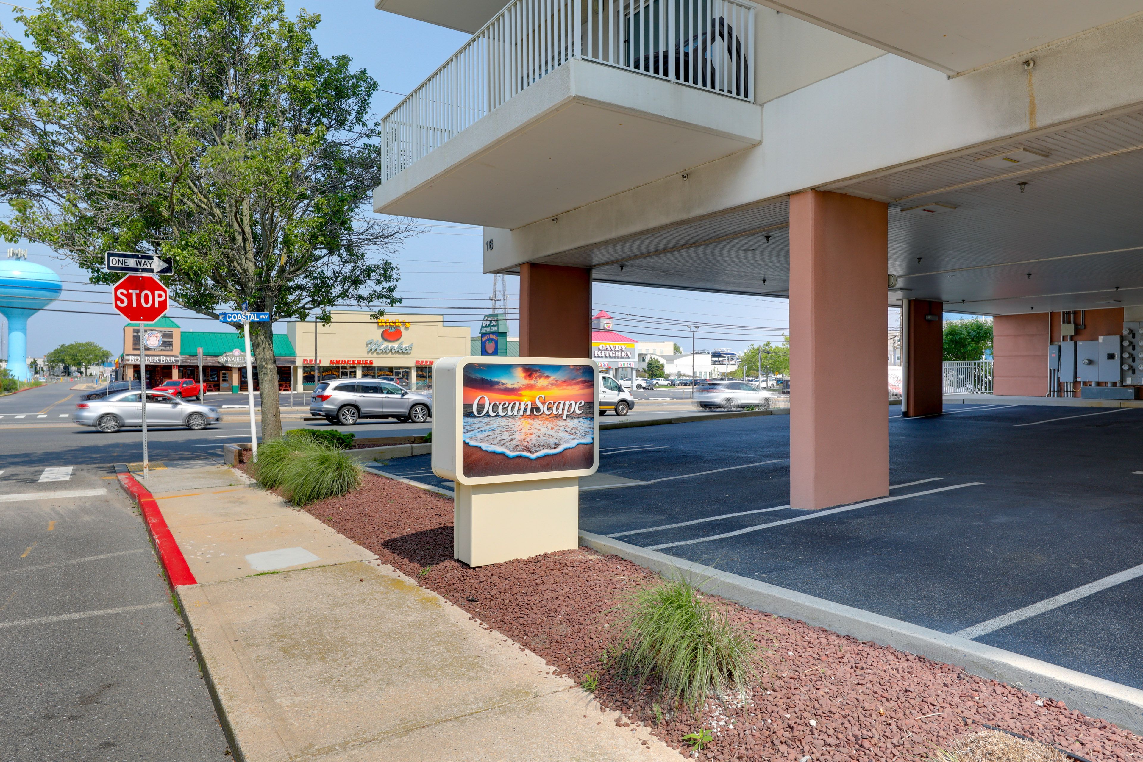 Condo Exterior | Parking | Community Garage (1 Vehicle) | Free Street Parking