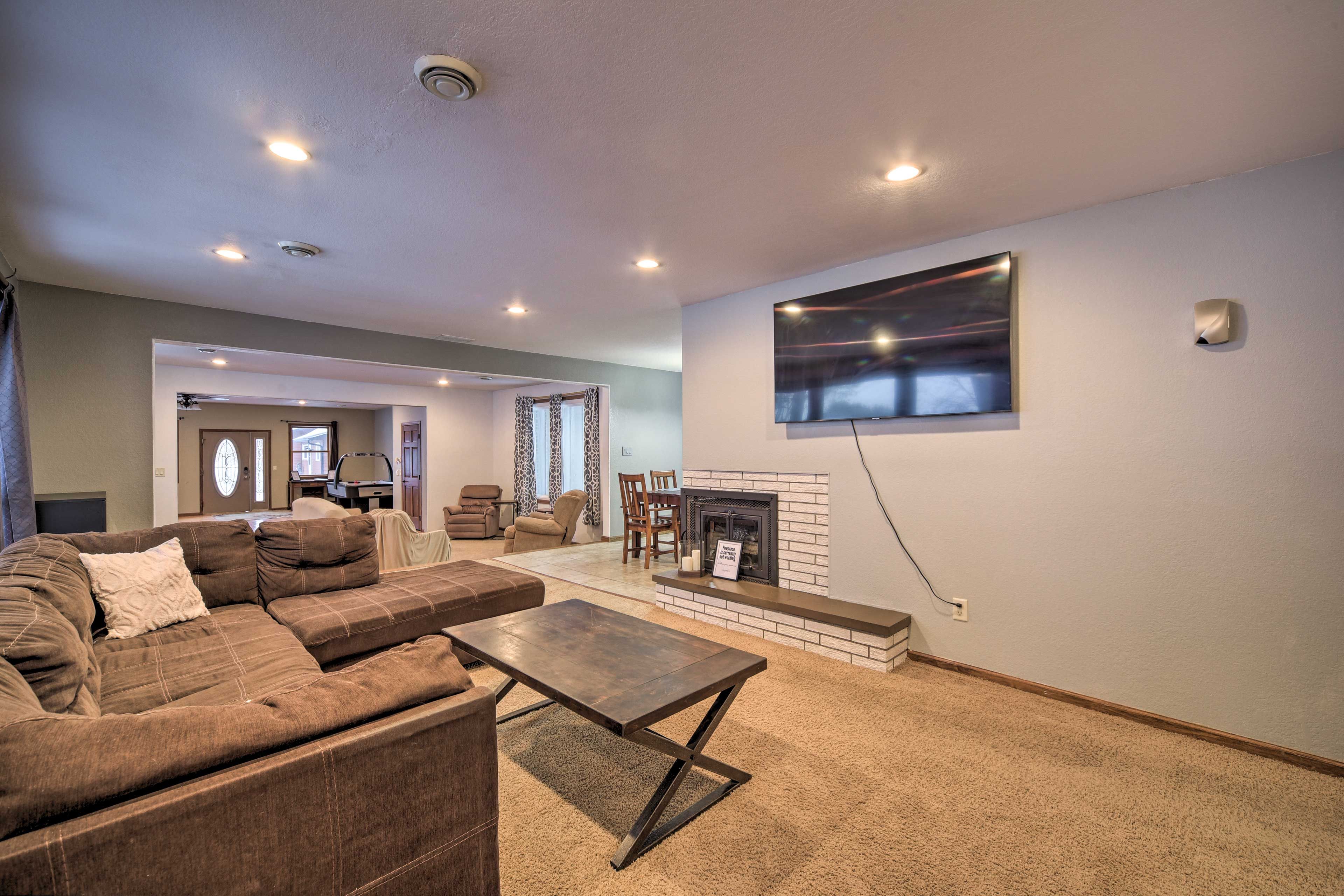 Living Rooms | Sleeper Sofa | Smart TV | Books