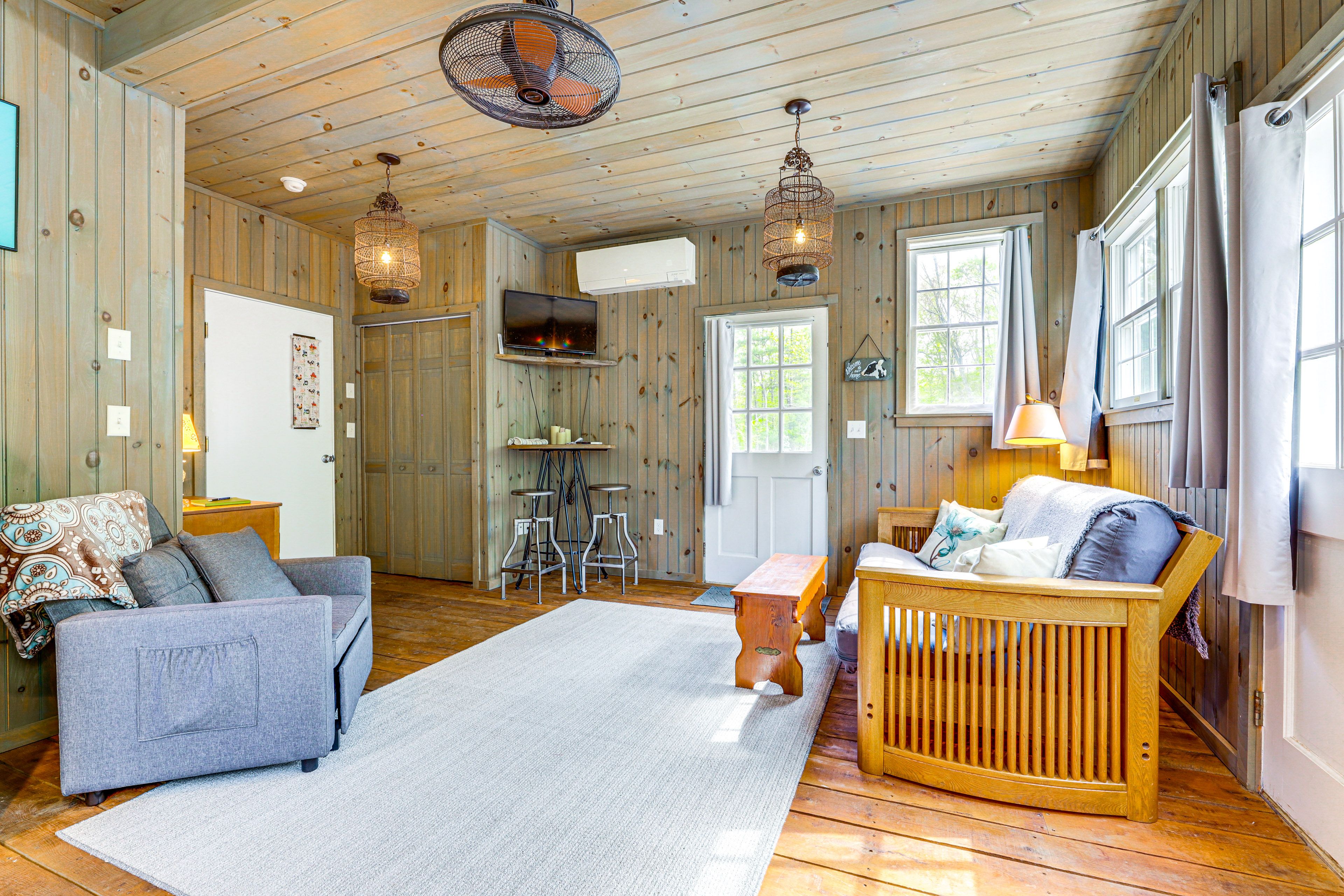 Living Area | Full Futon | Central Heating & A/C | Free WiFi